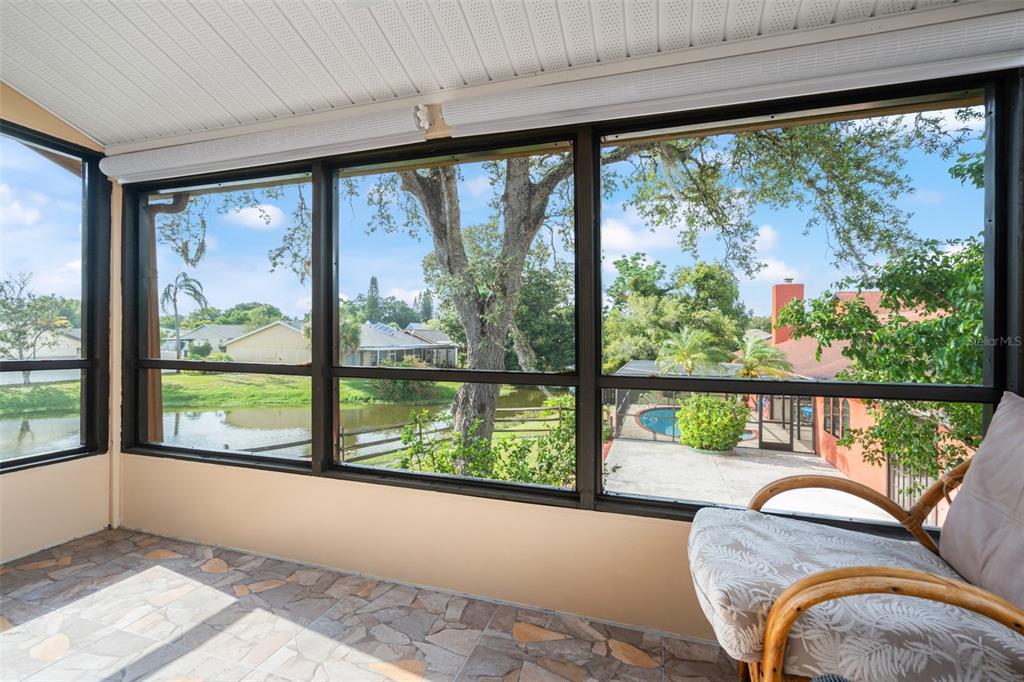 4036 Davit Drive New Port Richey, FL 34652 - Photo 5 of 64 a living room with large windows and furniture