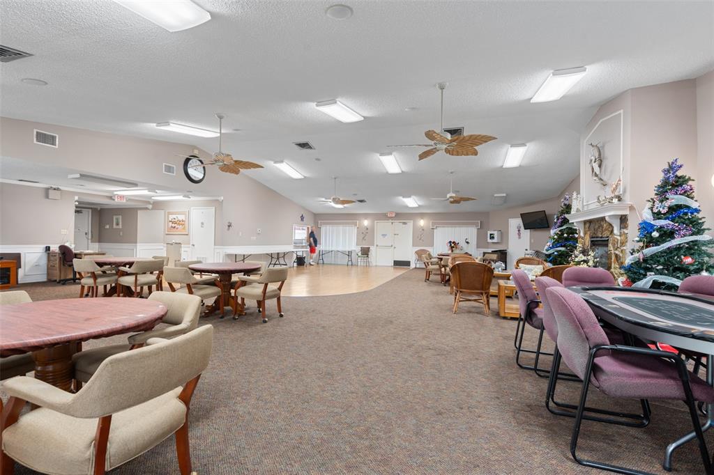 4036 Davit Drive New Port Richey, FL 34652 - Photo 51 of 64 a room with gym equipment and lots of furniture