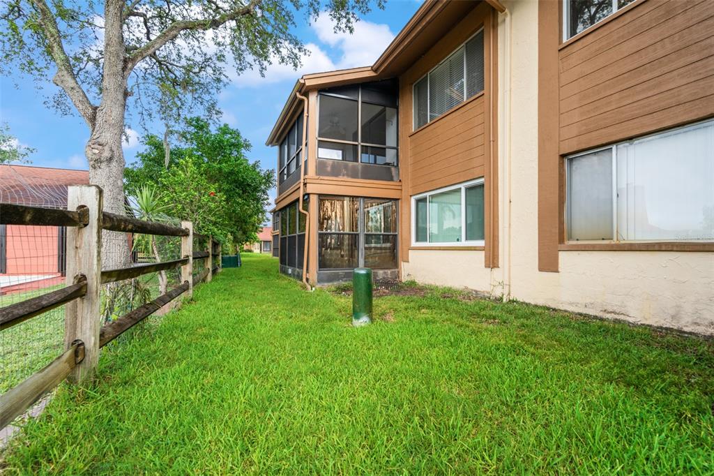 4036 Davit Drive New Port Richey, FL 34652 - Photo 60 of 64 a view of an house with backyard and garden