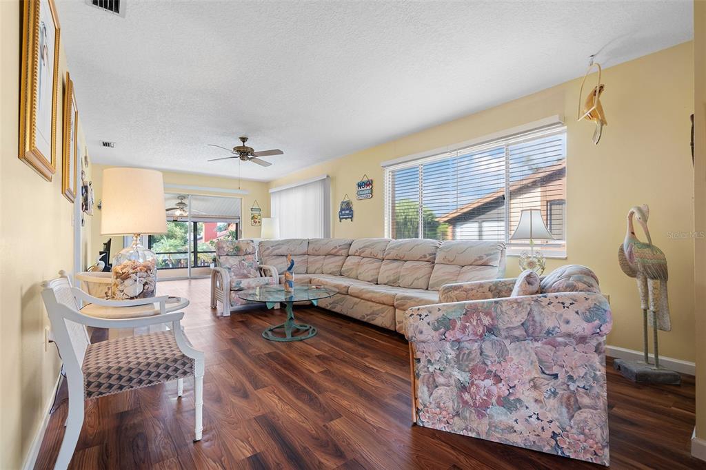 4036 Davit Drive New Port Richey, FL 34652 - Photo 8 of 64 a living room with furniture and a large window
