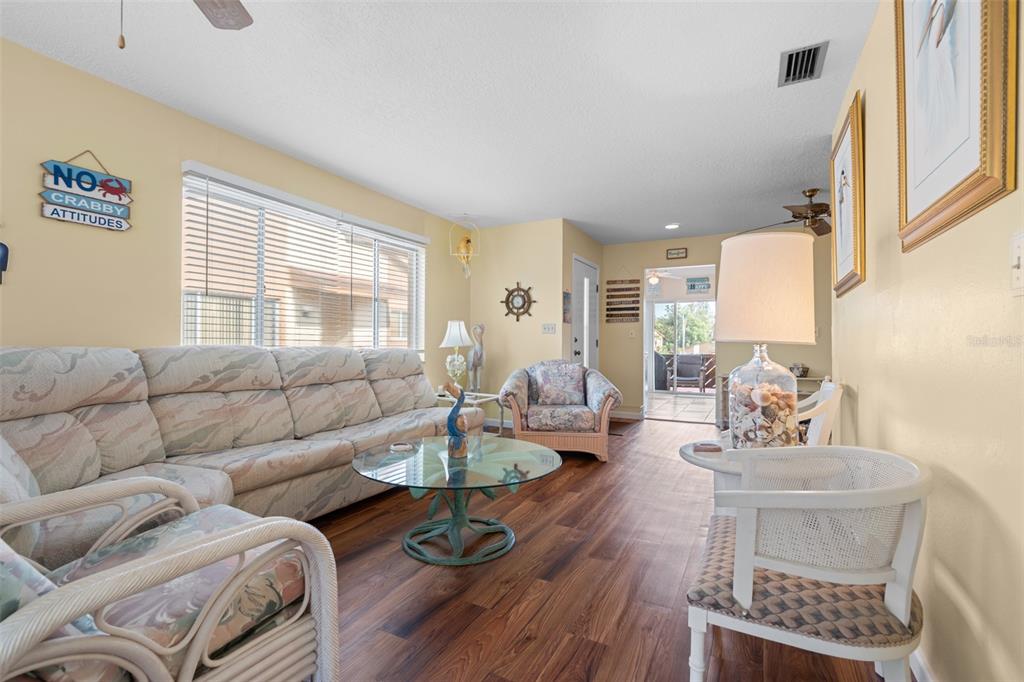 4036 Davit Drive New Port Richey, FL 34652 - Photo 9 of 64 a living room with furniture and wooden floor