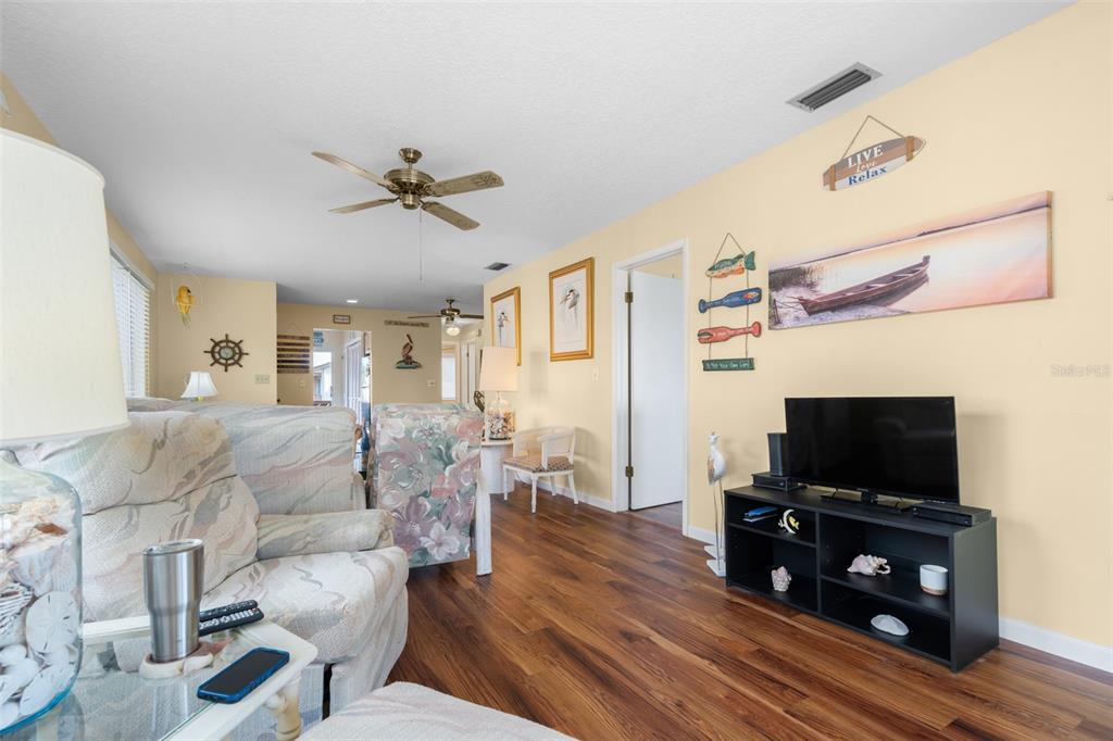 4036 Davit Drive New Port Richey, FL 34652 - Photo 10 of 64 a living room with furniture and a flat screen tv