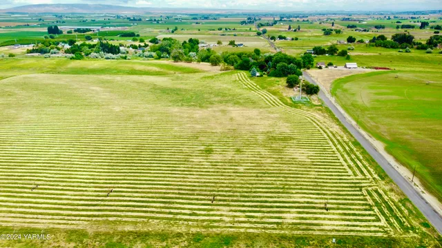 a view of a swimming pool and an outdoor space