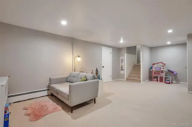 a living room with furniture and a couch