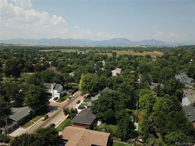 an aerial view of a city with lots of residential buildings
