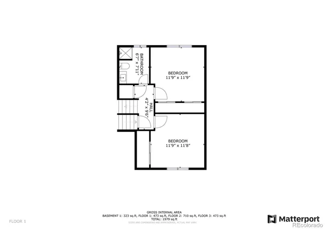 a picture of a bench in front of a wall