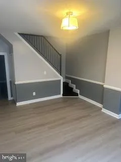 a view of a hallway with a window