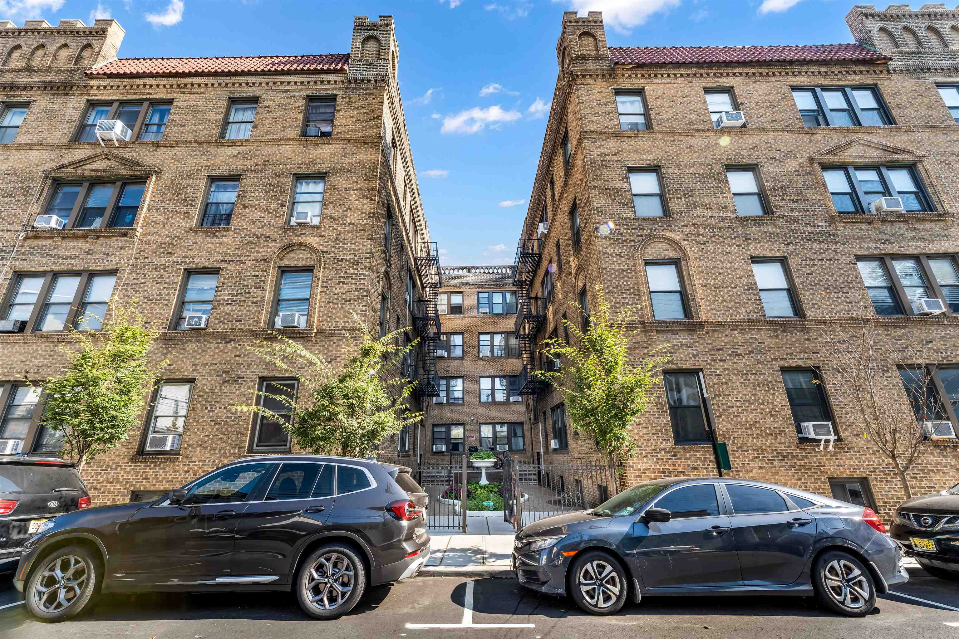 150 37th Street, Unit D4 Union City, NJ 07087 - Photo 17 of 22 a car parked in front of a building