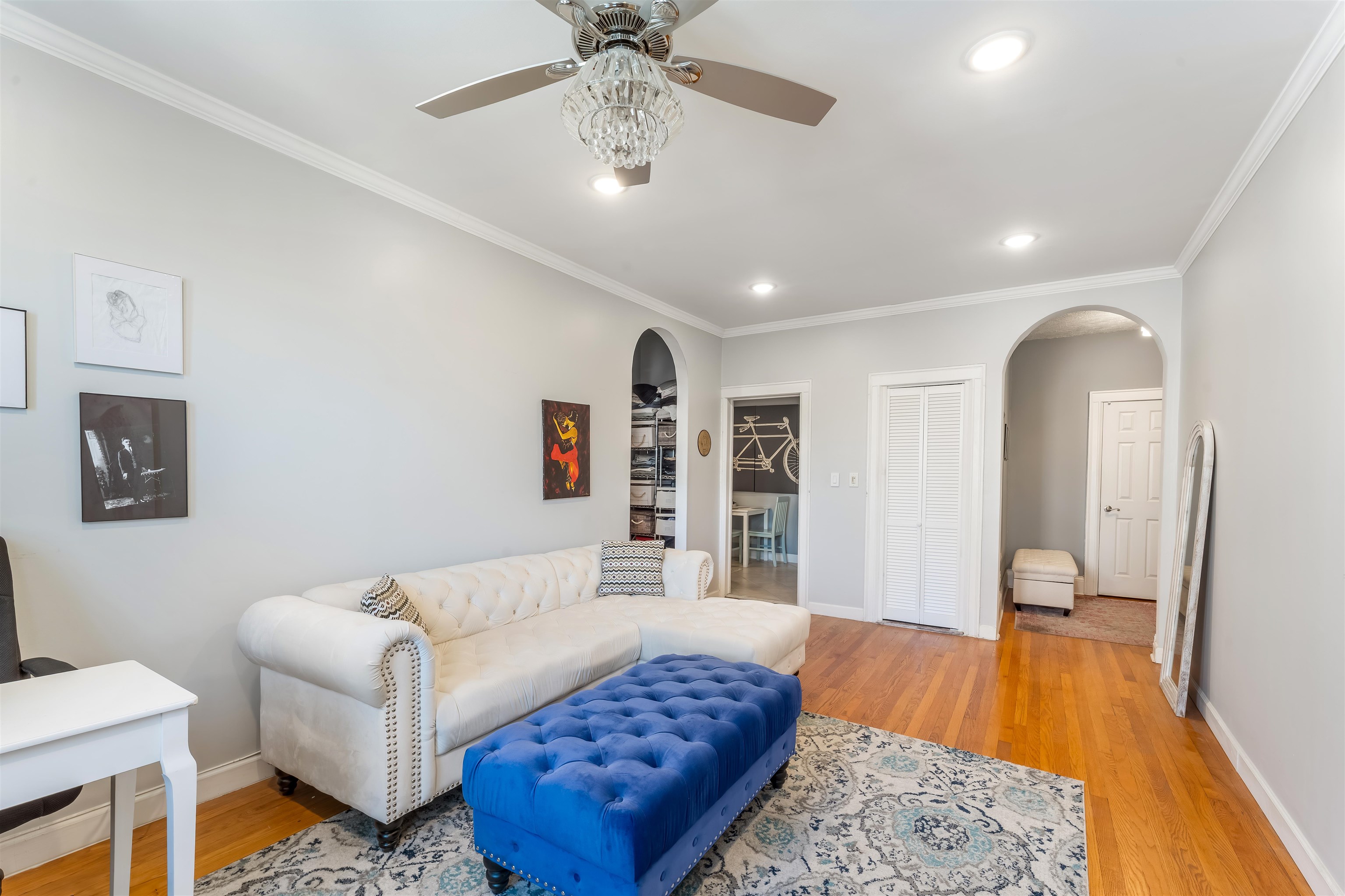 150 37th Street, Unit D4 Union City, NJ 07087 - Photo 2 of 22 a living room with furniture and a wooden floor
