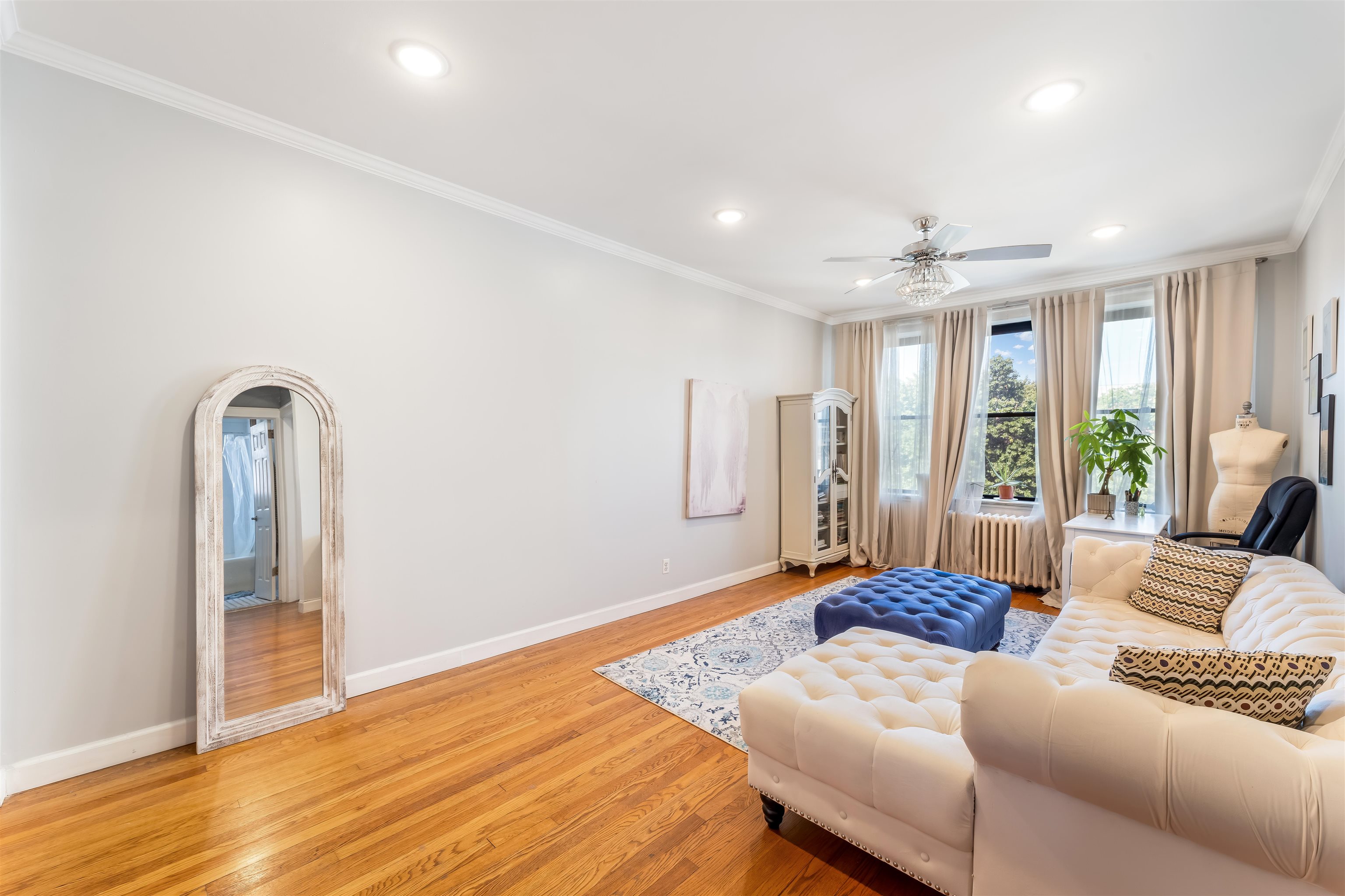 150 37th Street, Unit D4 Union City, NJ 07087 - Photo 9 of 22 a living room with furniture window and wooden floor