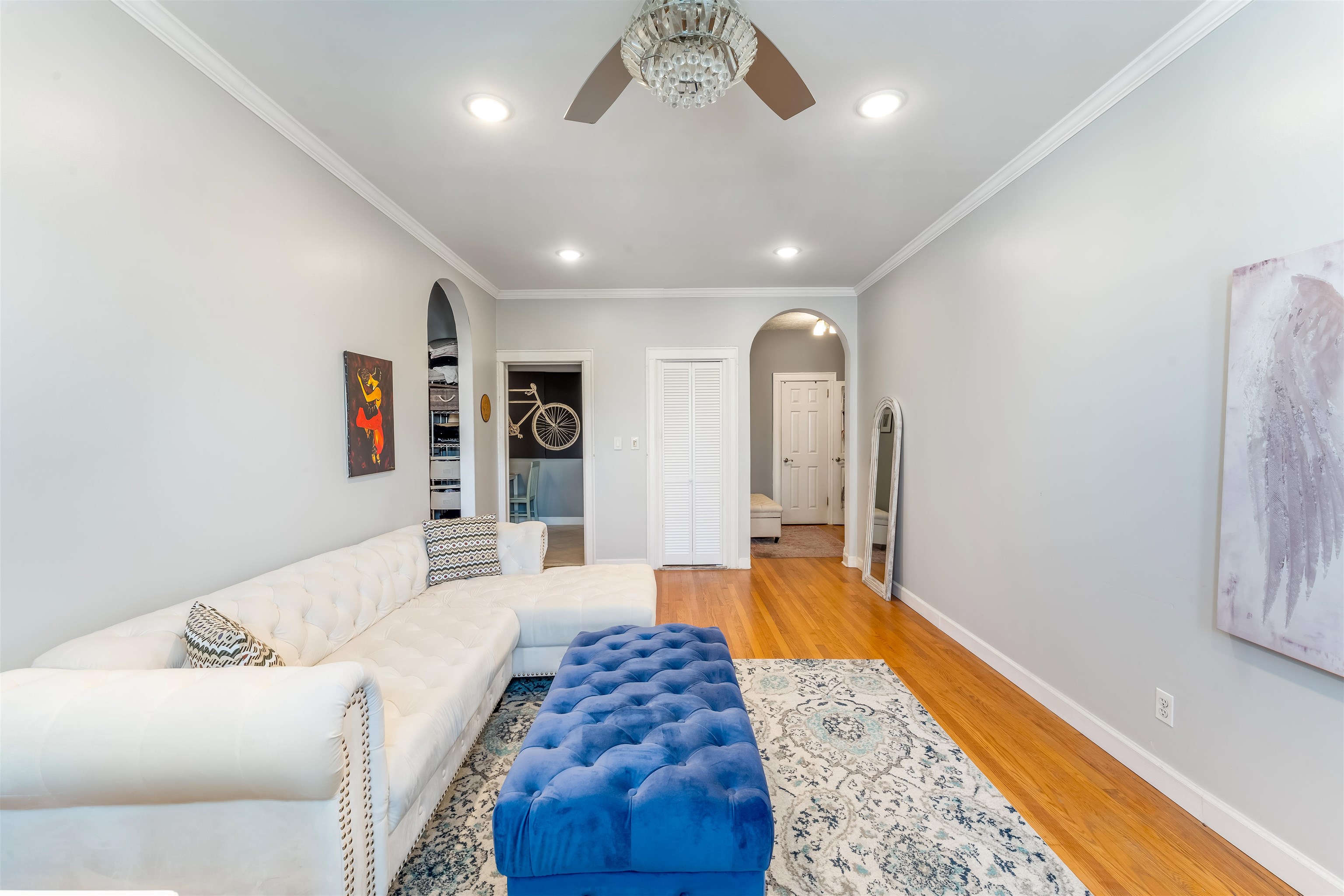 150 37th Street, Unit D4 Union City, NJ 07087 - Photo 10 of 22 a spacious bedroom with a large bed and a couch