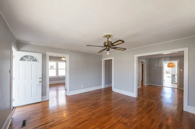 a kitchen with a stove a sink and a refrigerator
