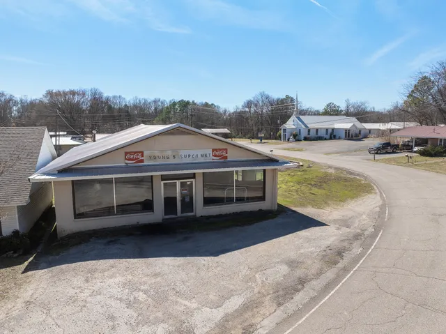 a view of swimming pool with a yard
