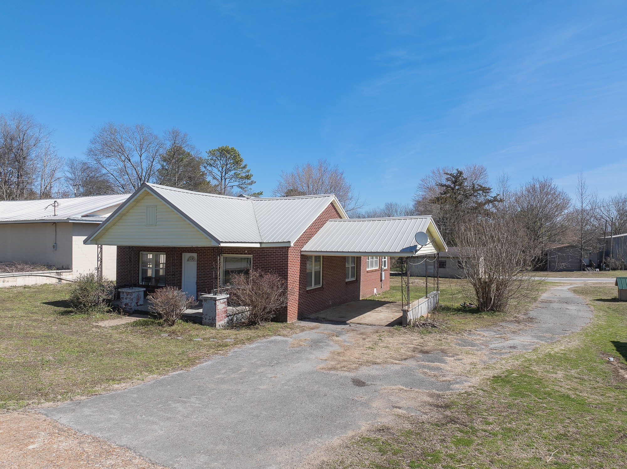 1213 Perryville Road Parsons, TN 38363 - Photo 7 of 32 a view of a house with a yard