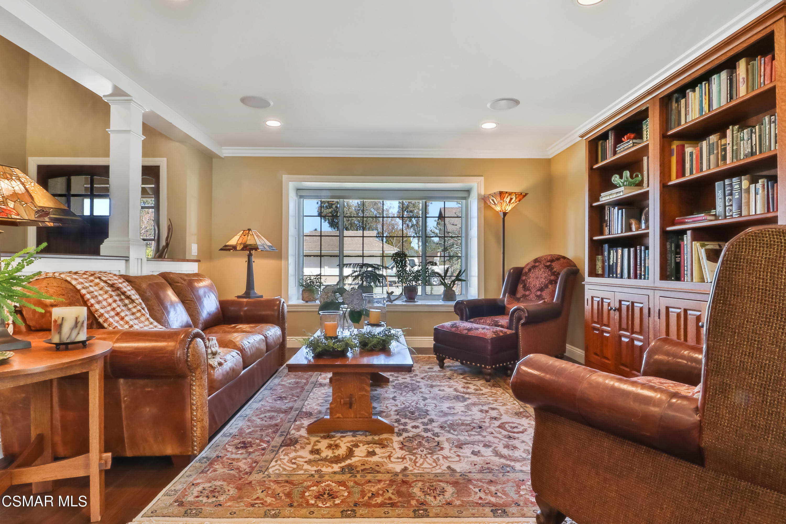 243 Longbranch Road Simi Valley, CA 93065 - Photo 15 of 77 a living room with furniture and a book shelf