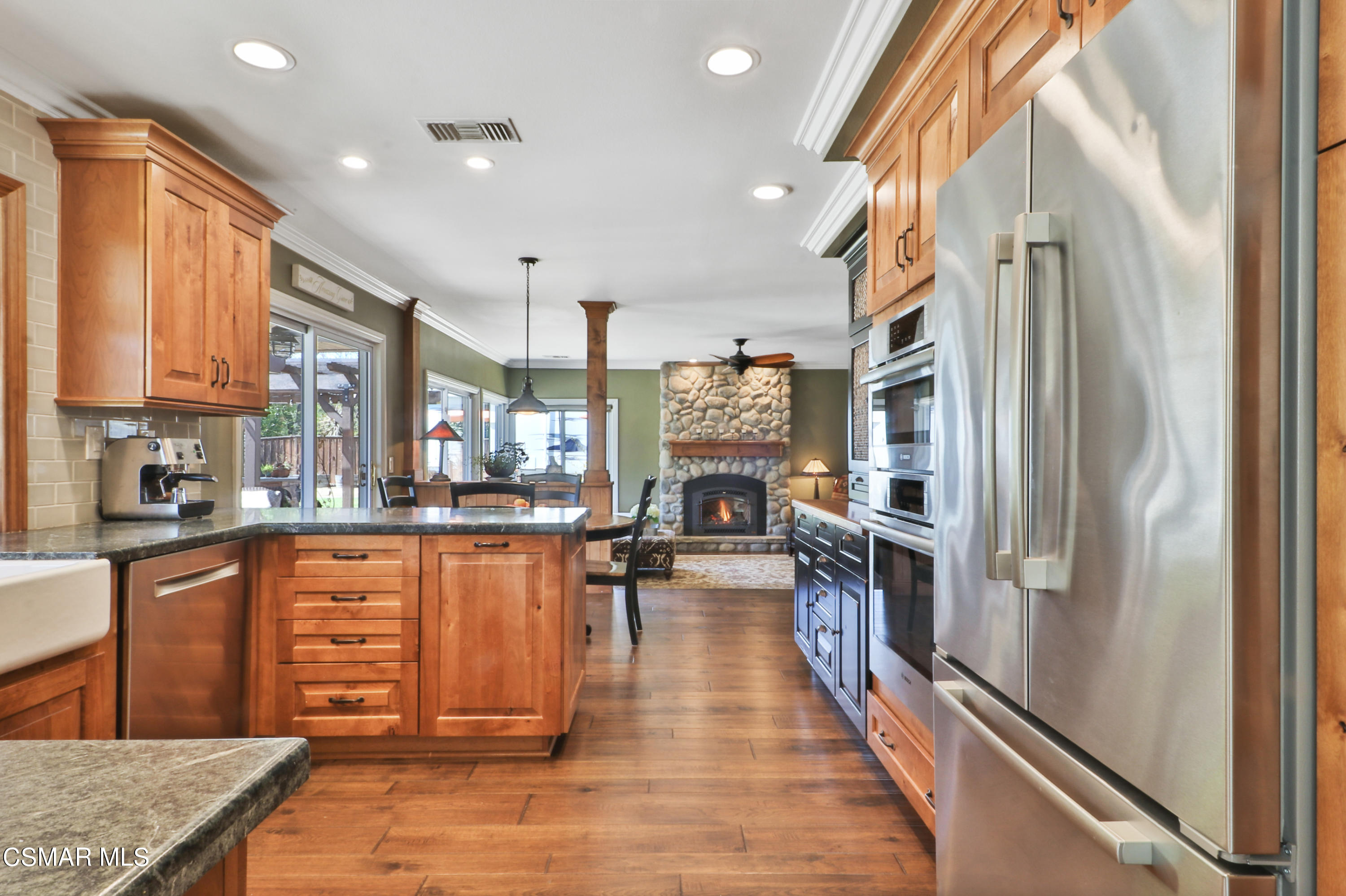 243 Longbranch Road Simi Valley, CA 93065 - Photo 19 of 77 a kitchen with stainless steel appliances granite countertop a refrigerator and a stove