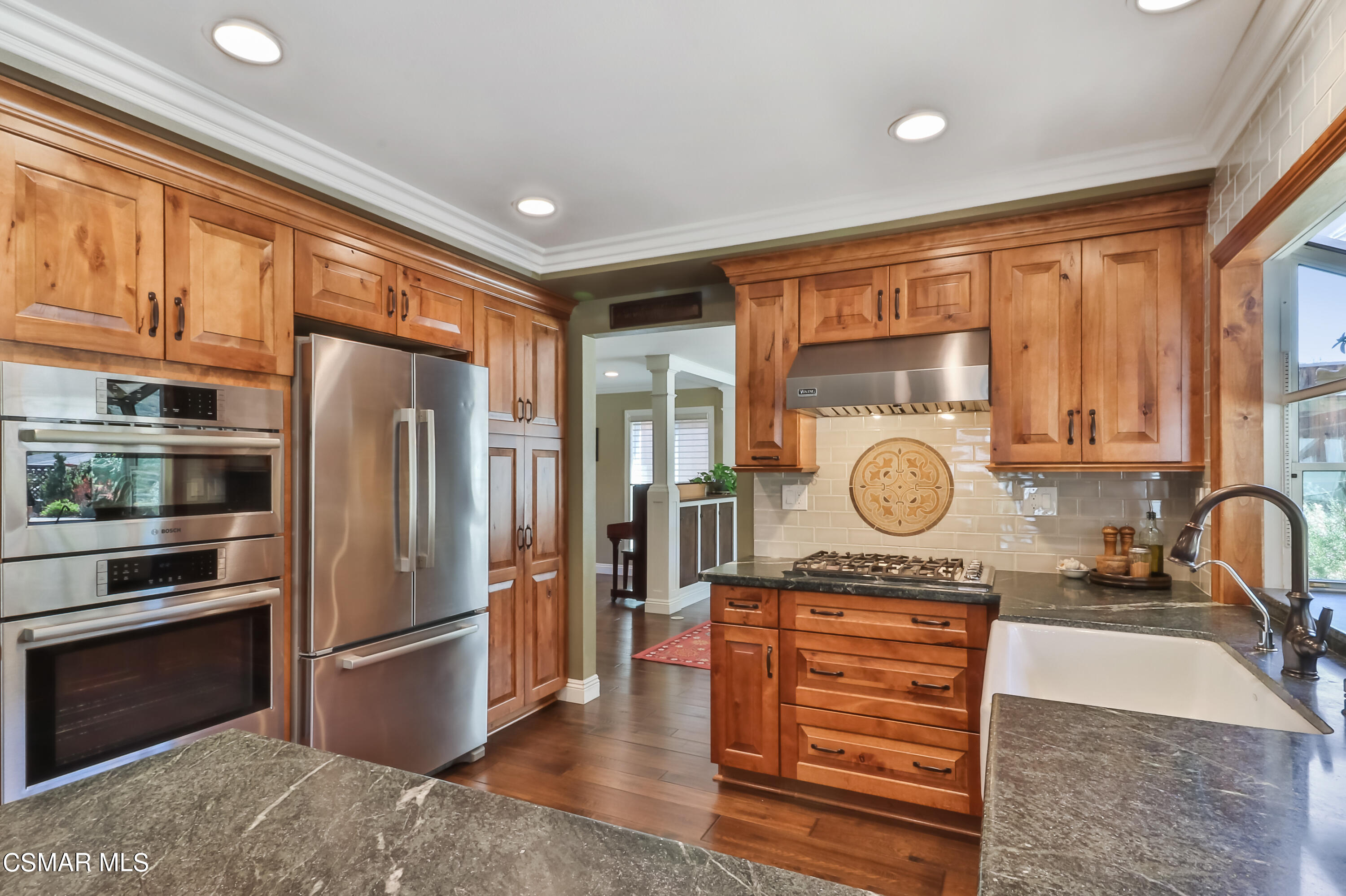 243 Longbranch Road Simi Valley, CA 93065 - Photo 20 of 77 a kitchen with a refrigerator a stove and a sink