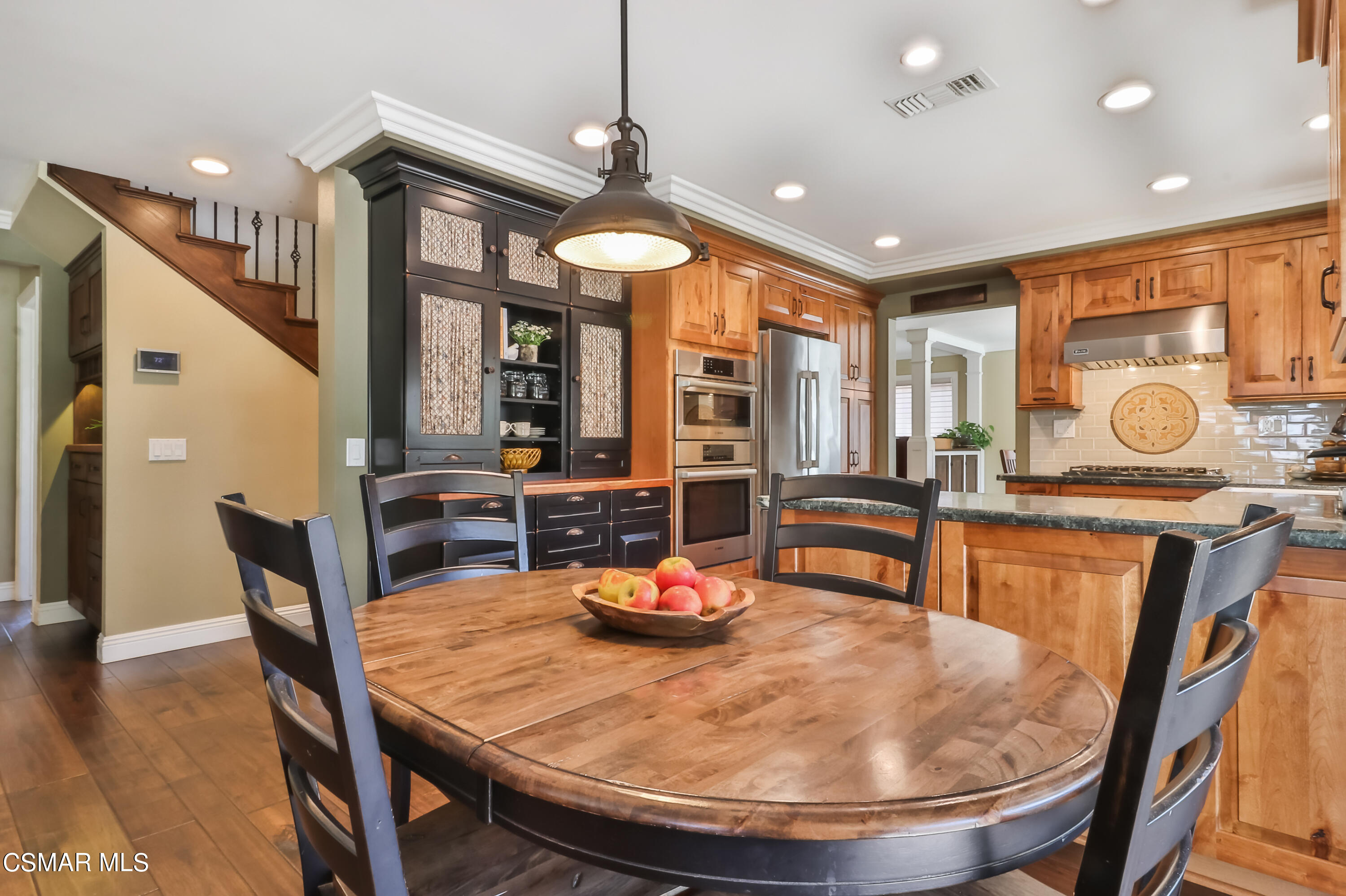 243 Longbranch Road Simi Valley, CA 93065 - Photo 24 of 77 a dining room with furniture and wooden floor