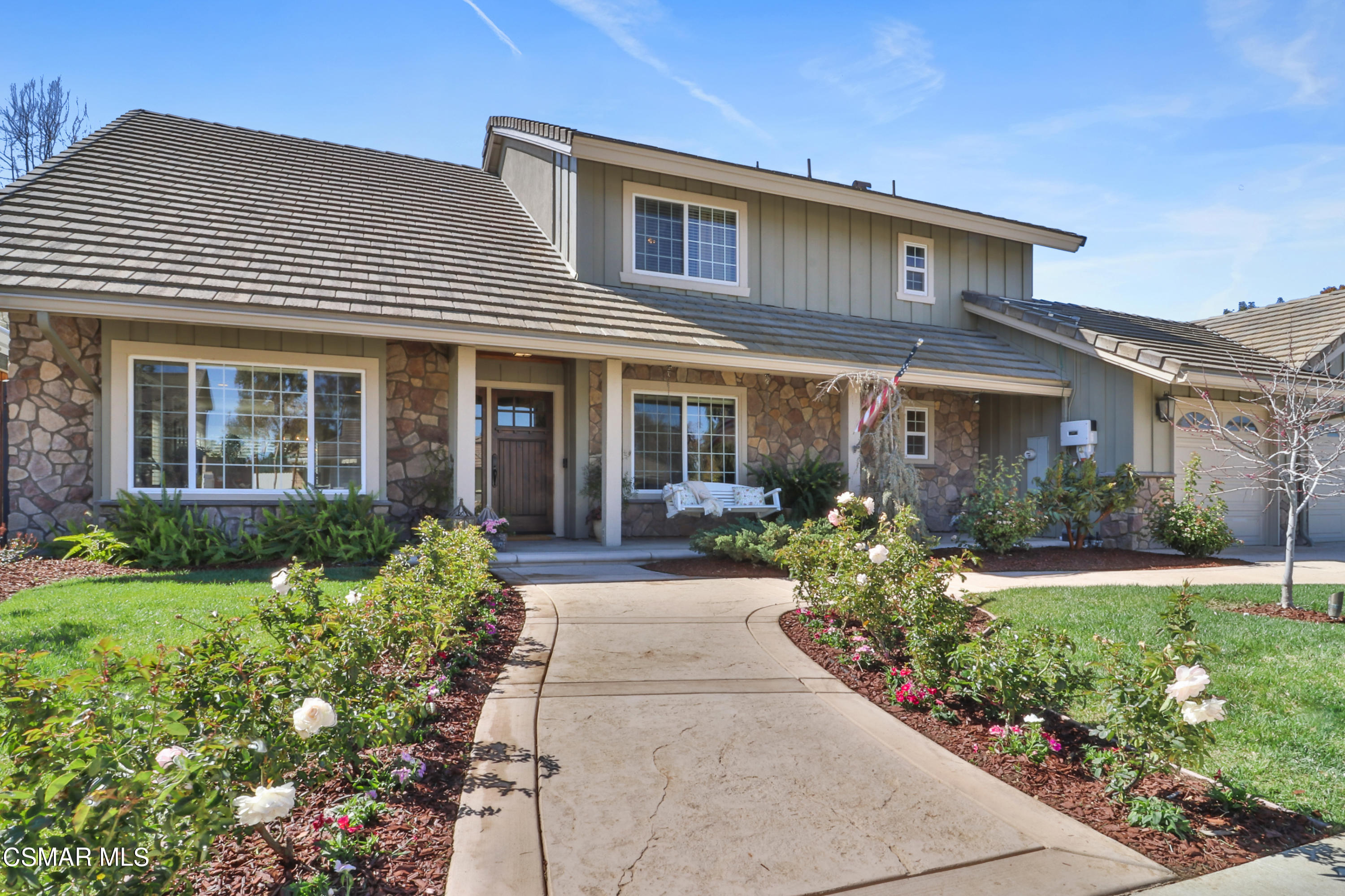 243 Longbranch Road Simi Valley, CA 93065 - Photo 4 of 77 front view of a house with a yard