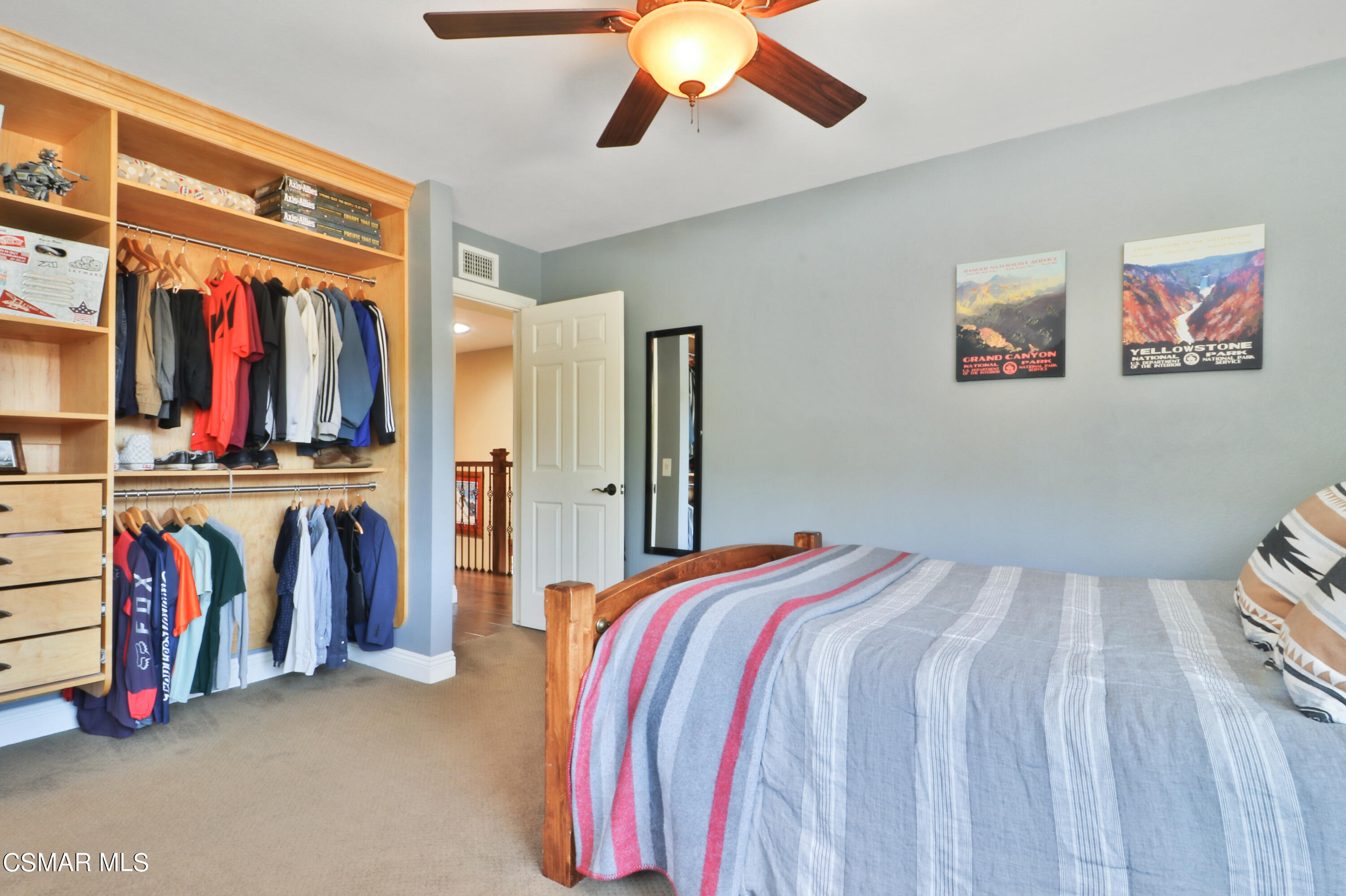 243 Longbranch Road Simi Valley, CA 93065 - Photo 34 of 77 a bed room with a bed and a walk in closet