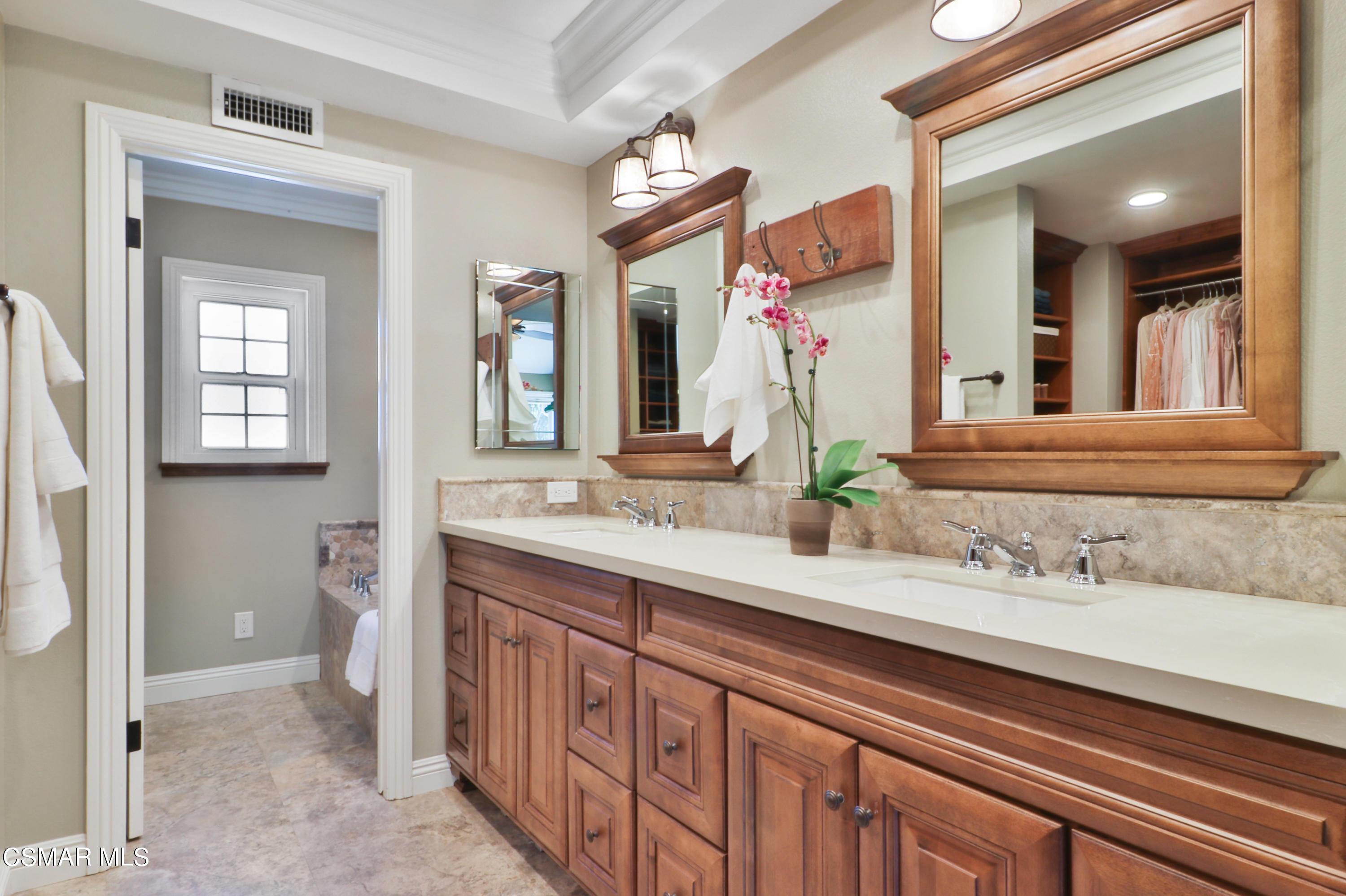 243 Longbranch Road Simi Valley, CA 93065 - Photo 41 of 77 a bathroom with a sink and a mirror