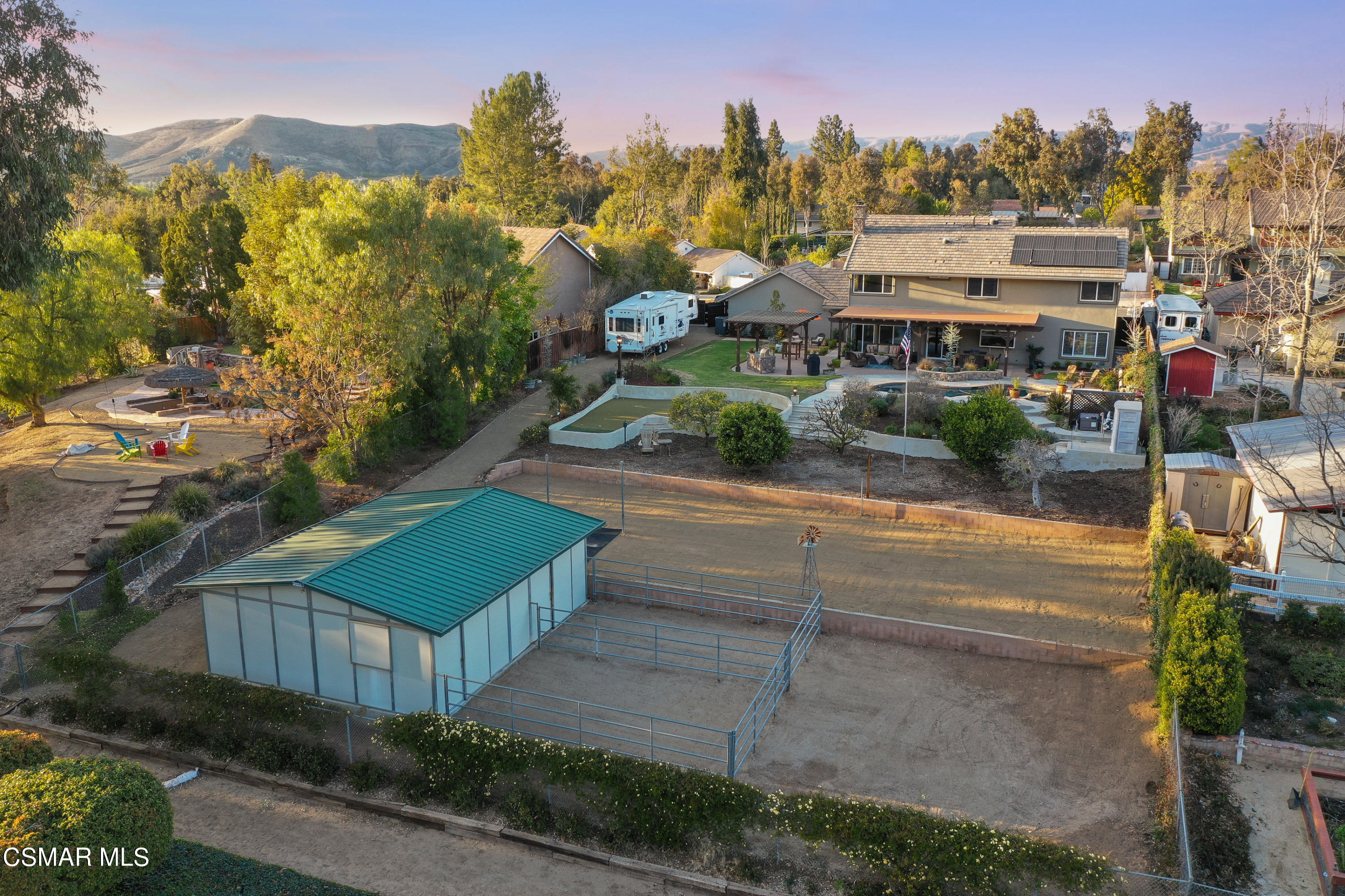 243 Longbranch Road Simi Valley, CA 93065 - Photo 66 of 77 a aerial view of a house with a garden and trees