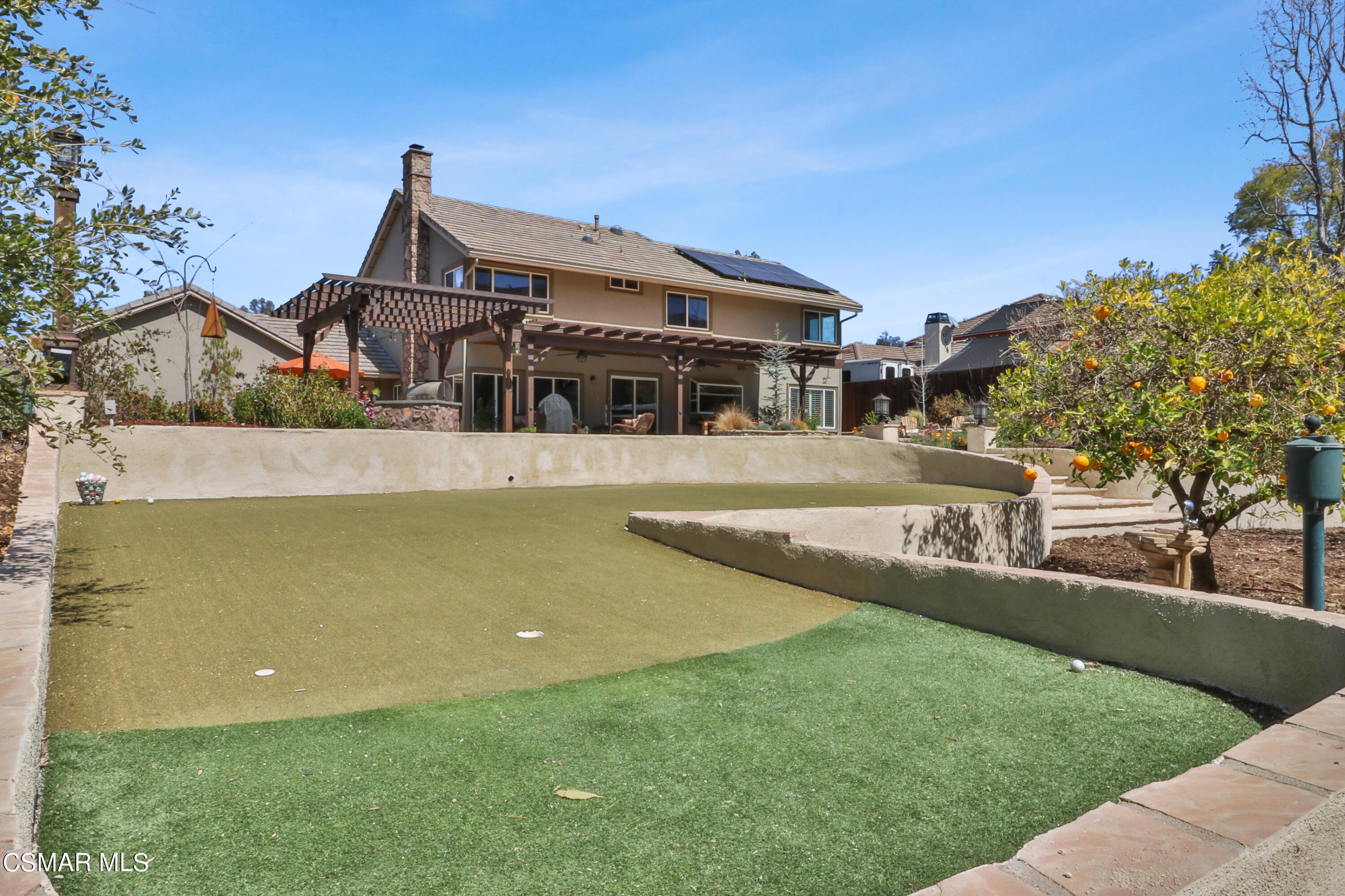 243 Longbranch Road Simi Valley, CA 93065 - Photo 67 of 77 a front view of a house with a yard