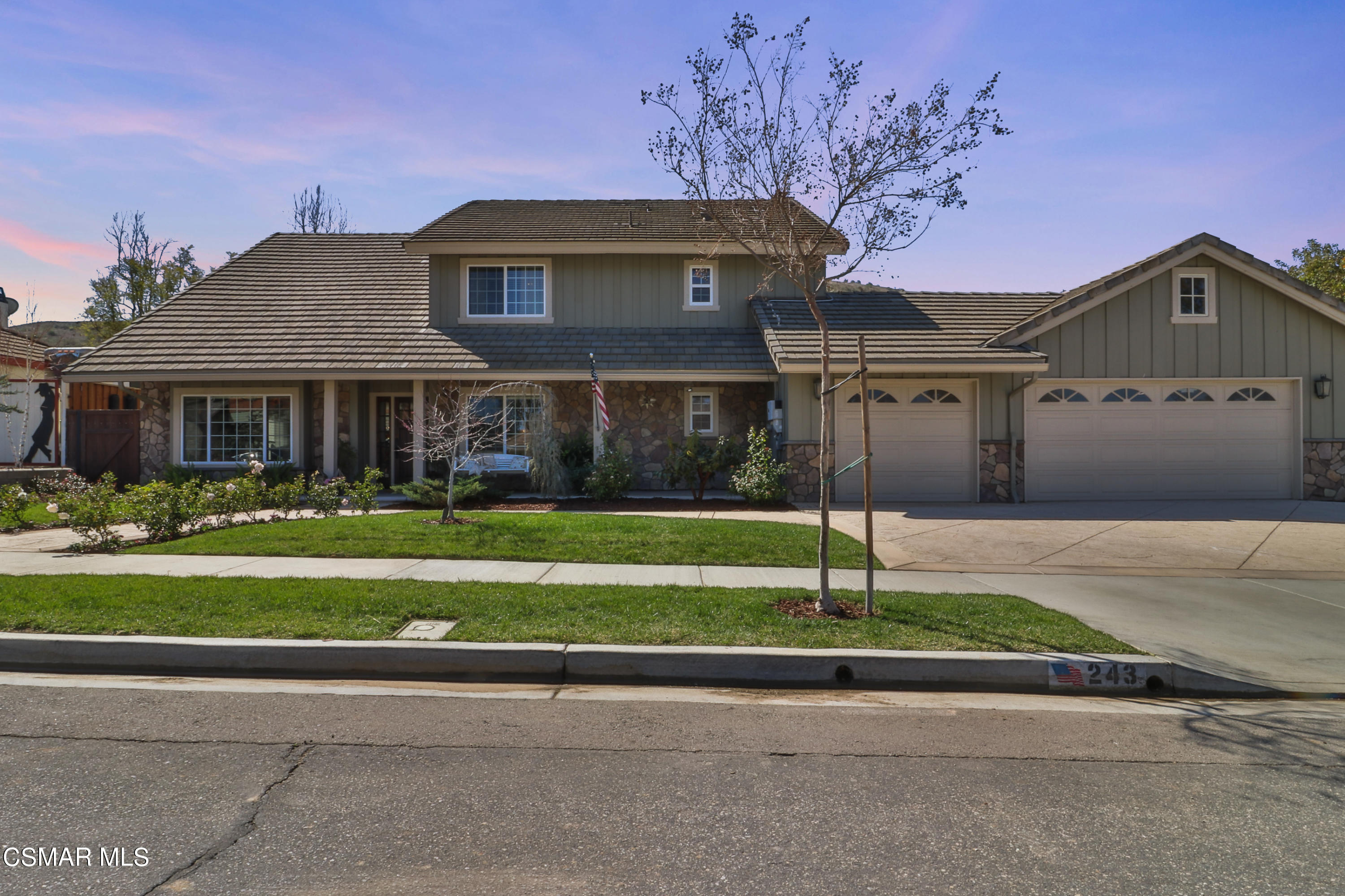 243 Longbranch Road Simi Valley, CA 93065 - Photo 8 of 77 a front view of a house with a yard