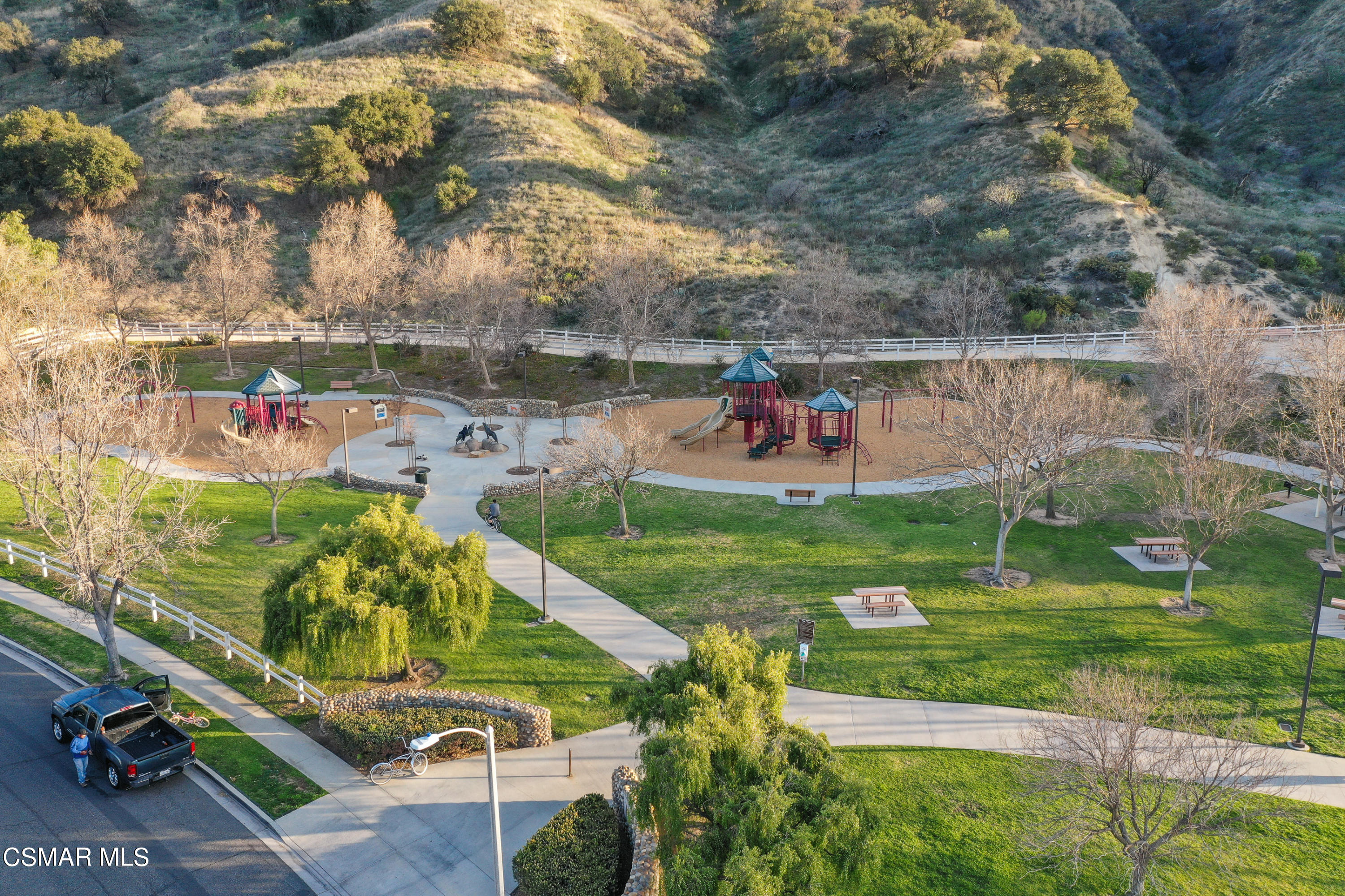 243 Longbranch Road Simi Valley, CA 93065 - Photo 76 of 77 a view of backyard with table and chairs and potted plants