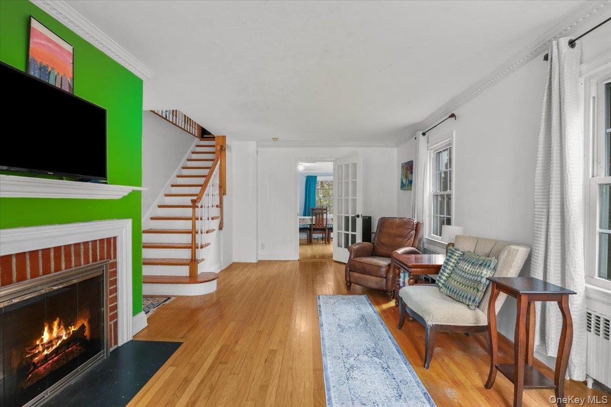 74 White Road Scarsdale, NY 10583 - Photo 3 of 27 a living room with furniture and a fireplace