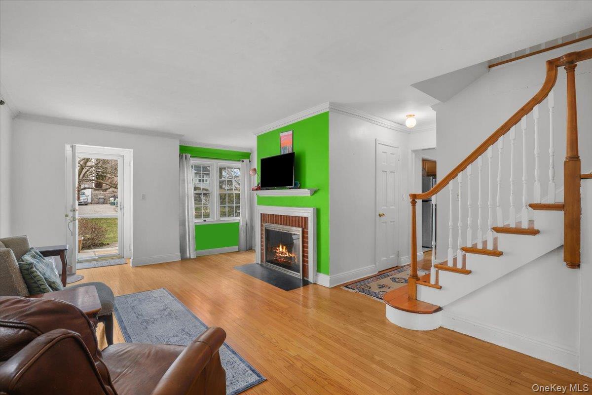 74 White Road Scarsdale, NY 10583 - Photo 4 of 27 a living room with furniture and a fireplace