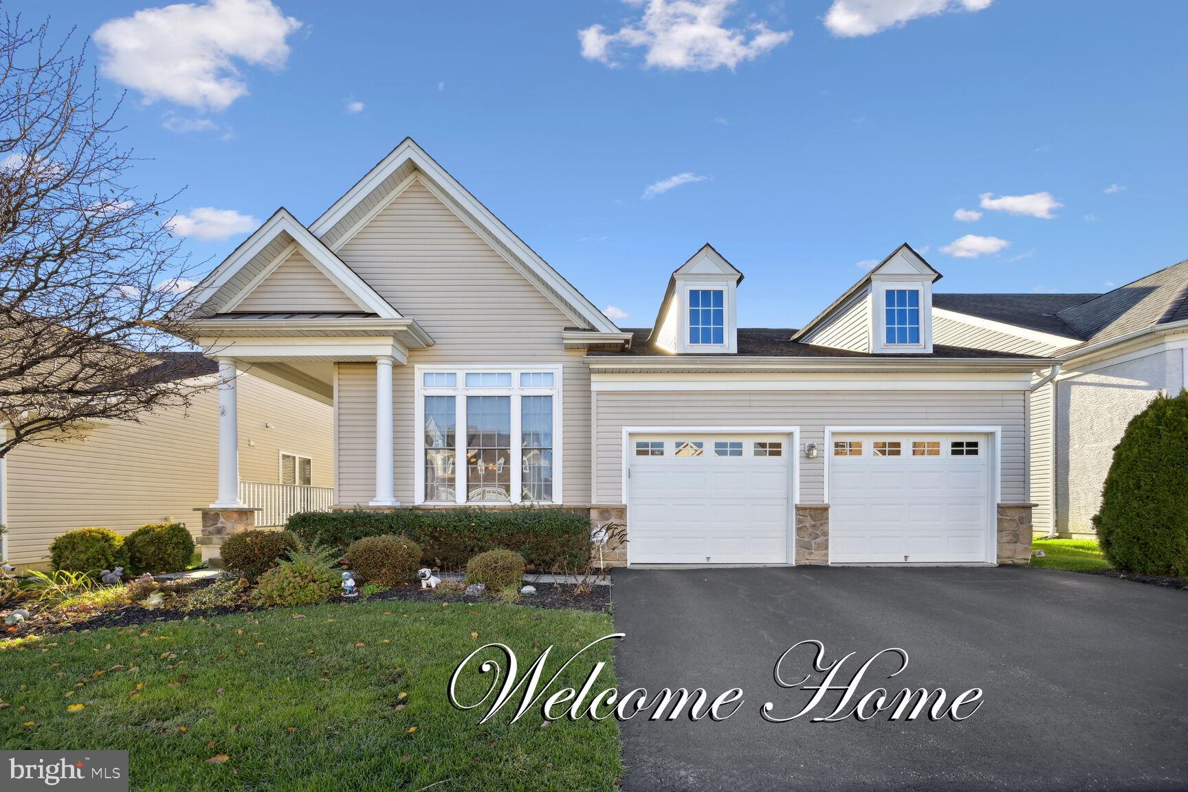 30 Goddard Drive Cranbury, NJ 08512 - Photo 1 of 29 a front view of a house with garden