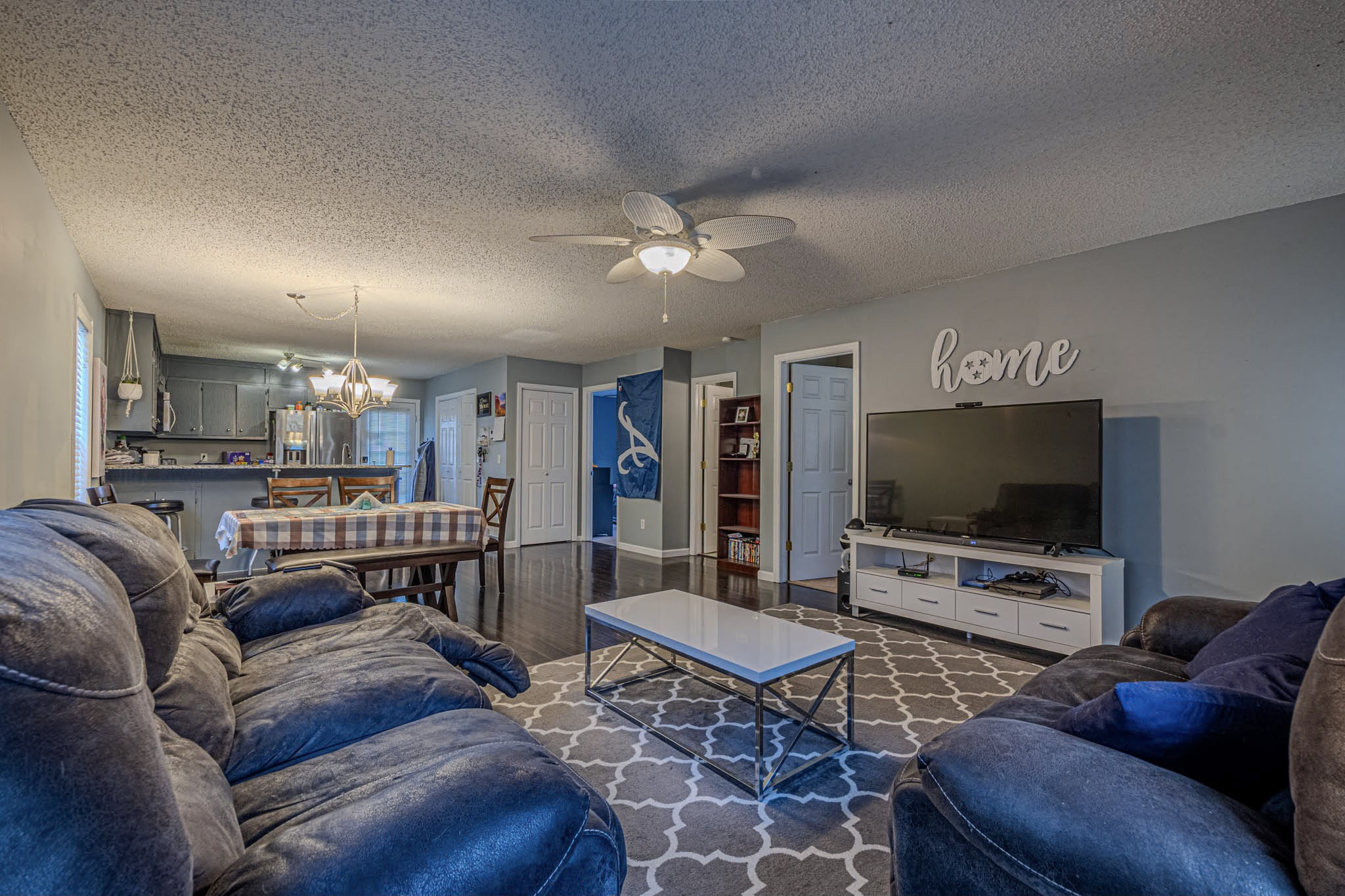 25230 Union Hill Road Ardmore, TN 38449 - Photo 16 of 55 a living room with furniture and a flat screen tv