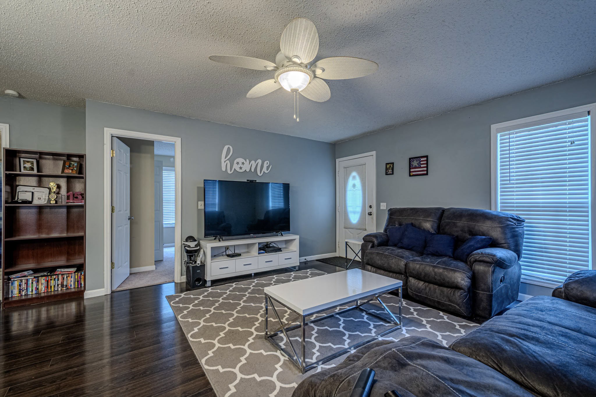25230 Union Hill Road Ardmore, TN 38449 - Photo 17 of 55 a living room with furniture and a flat screen tv