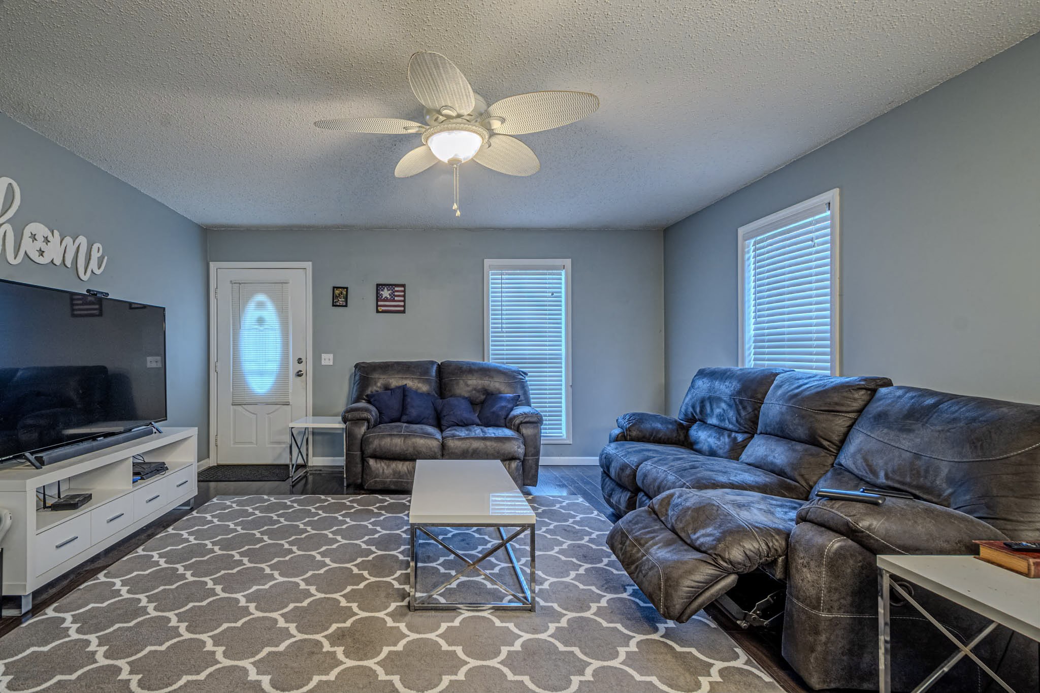 25230 Union Hill Road Ardmore, TN 38449 - Photo 18 of 55 a living room with furniture and a flat screen tv