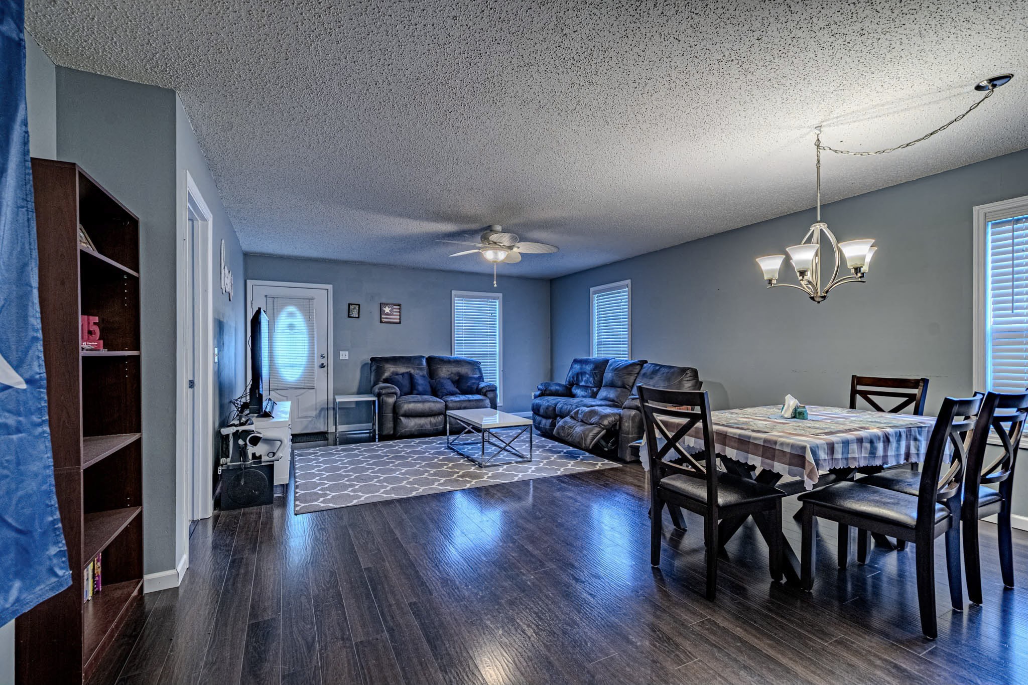 25230 Union Hill Road Ardmore, TN 38449 - Photo 22 of 55 a view of a dining room with furniture wooden floor and chandelier