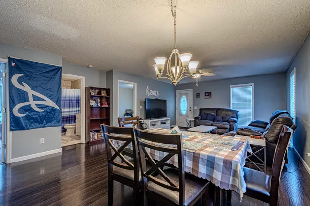 a kitchen with lots of counter top space and living room