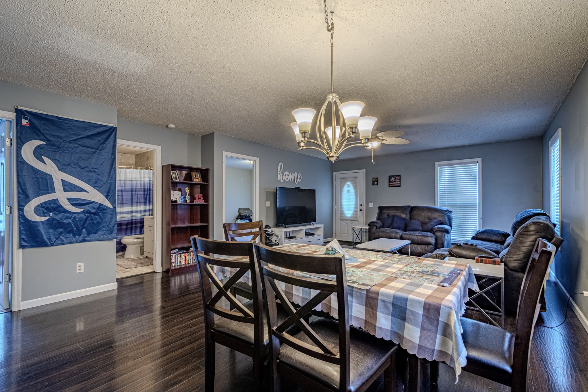 25230 Union Hill Road Ardmore, TN 38449 - Photo 24 of 55 a view of a dining room with furniture and wooden floor