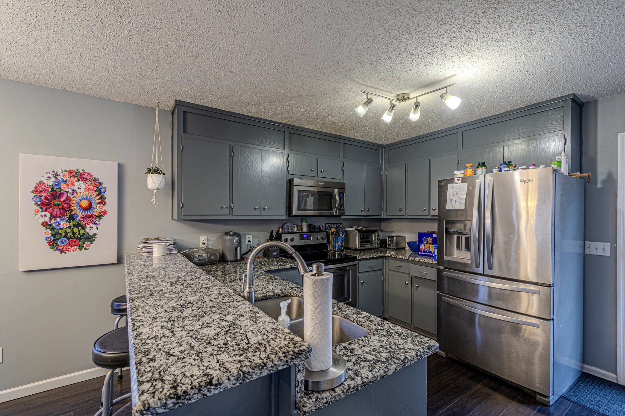 25230 Union Hill Road Ardmore, TN 38449 - Photo 26 of 55 a kitchen with granite countertop a refrigerator and a sink