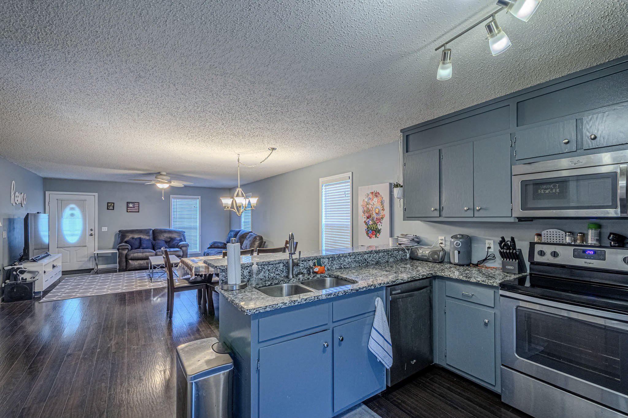 25230 Union Hill Road Ardmore, TN 38449 - Photo 27 of 55 a kitchen with lots of counter top space and living room