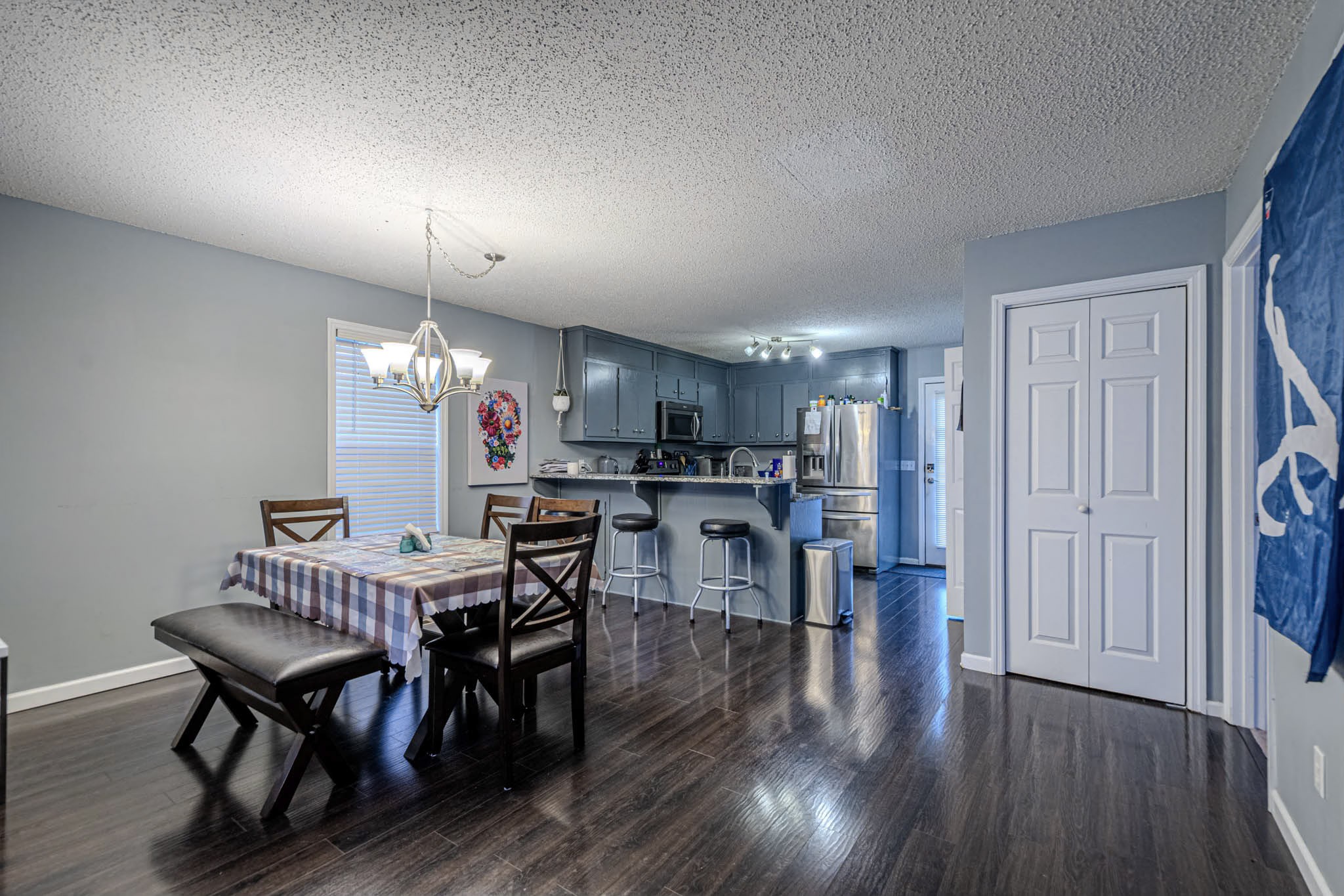 25230 Union Hill Road Ardmore, TN 38449 - Photo 44 of 55 a view of a dining room with furniture and wooden floor
