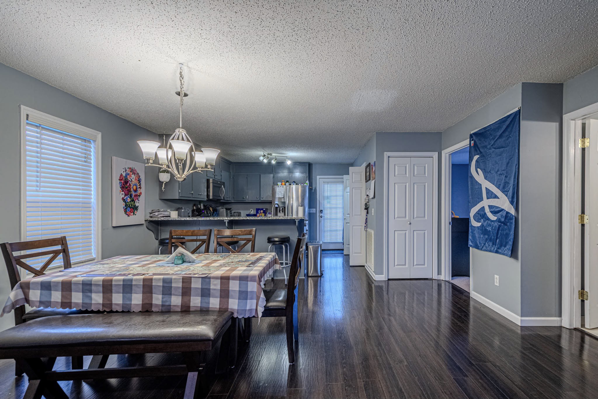 25230 Union Hill Road Ardmore, TN 38449 - Photo 46 of 55 a view of a dining room with furniture wooden floor and chandelier