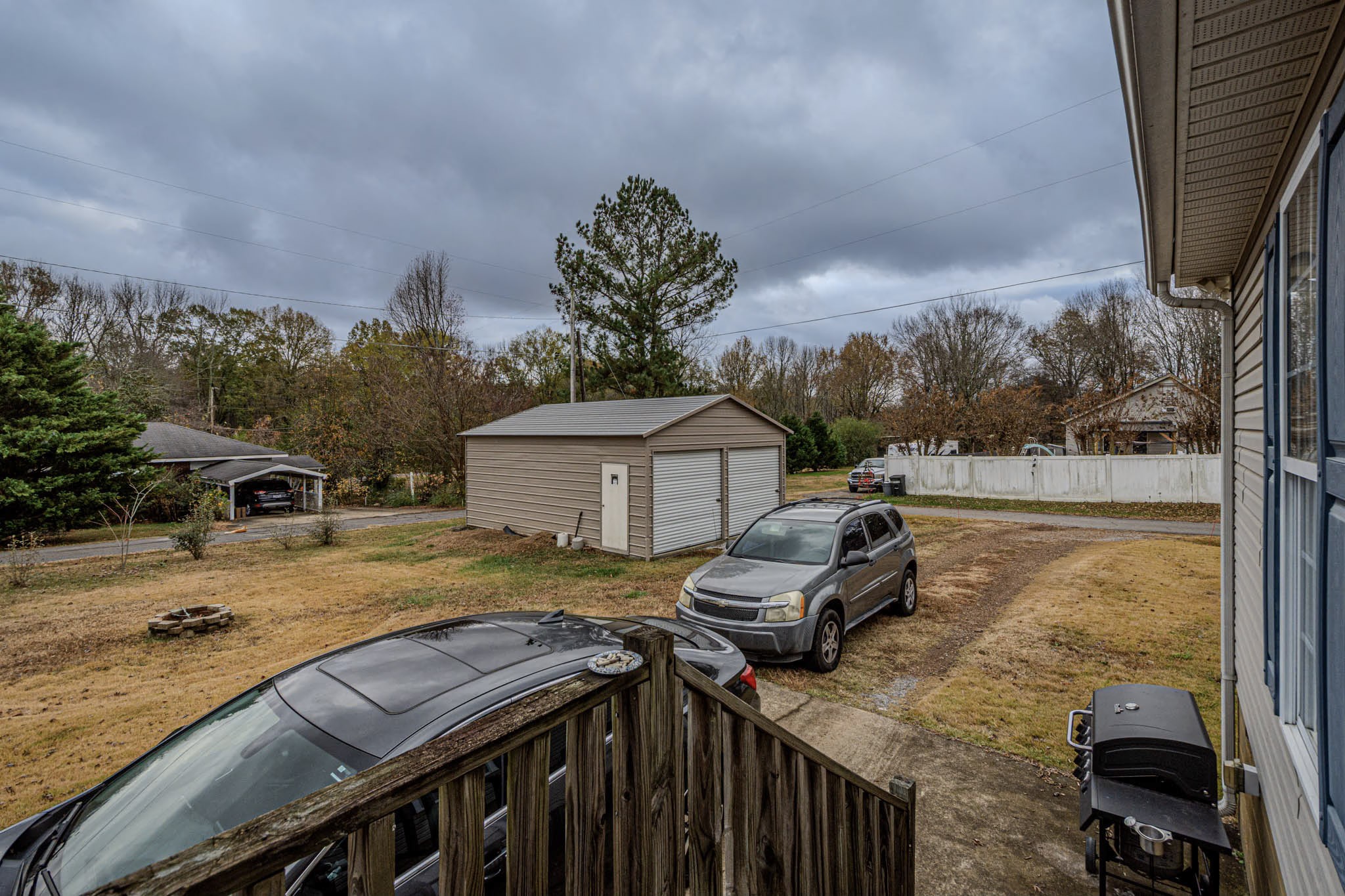 25230 Union Hill Road Ardmore, TN 38449 - Photo 50 of 55 a view of a roof deck with couches and wooden floor