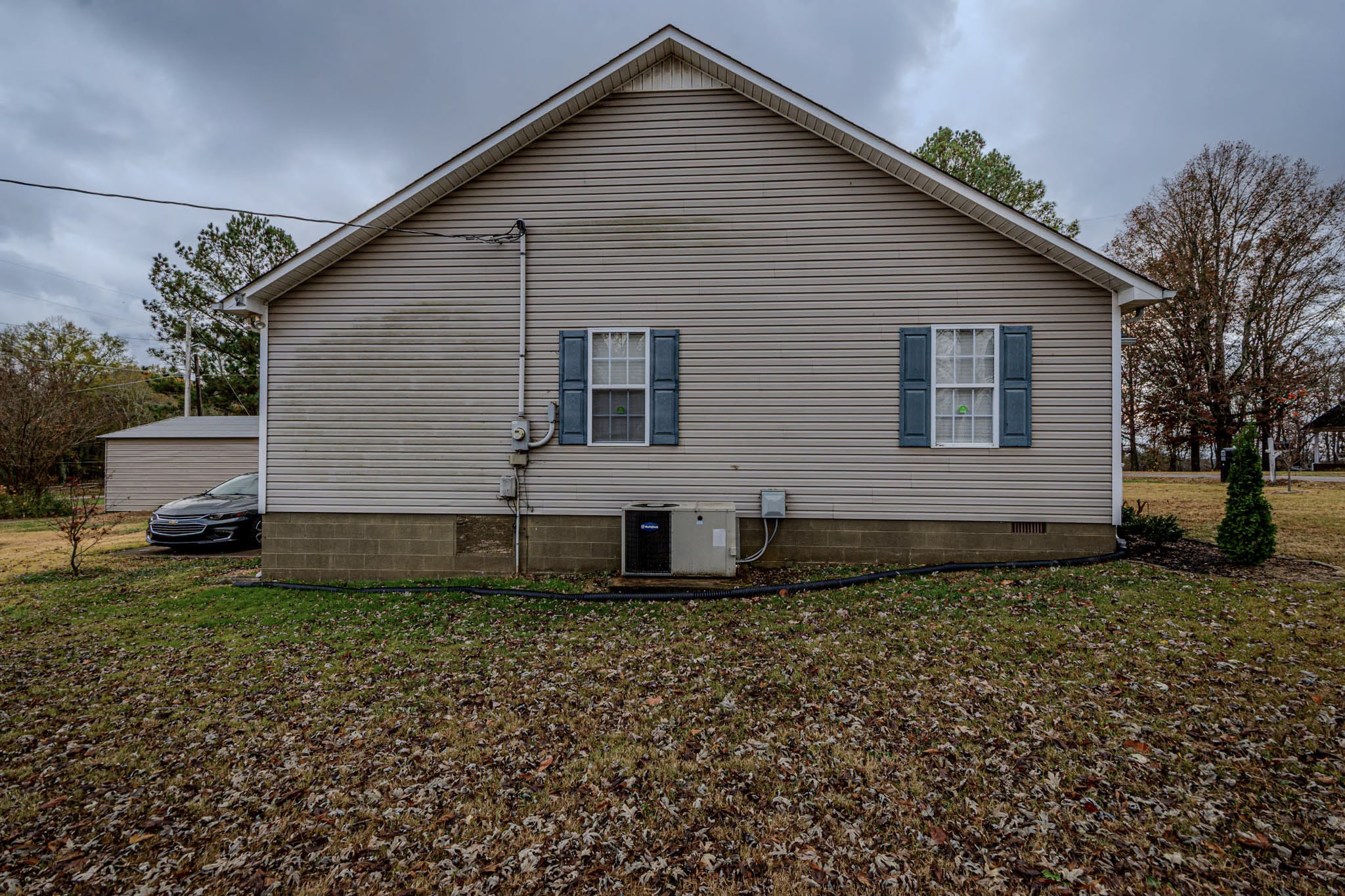 25230 Union Hill Road Ardmore, TN 38449 - Photo 5 of 55 a front view of a house with a garden