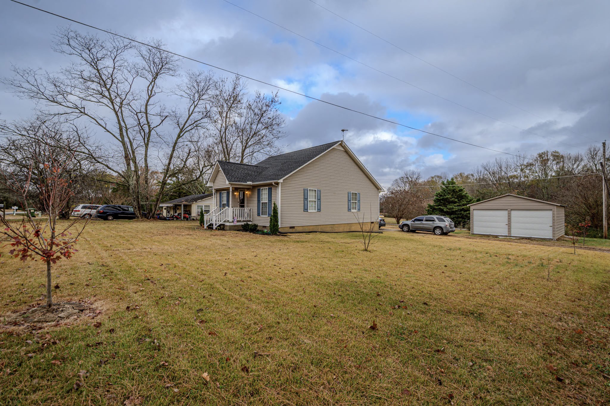 25230 Union Hill Road Ardmore, TN 38449 - Photo 8 of 55 a front view of house with yard and trees in the background