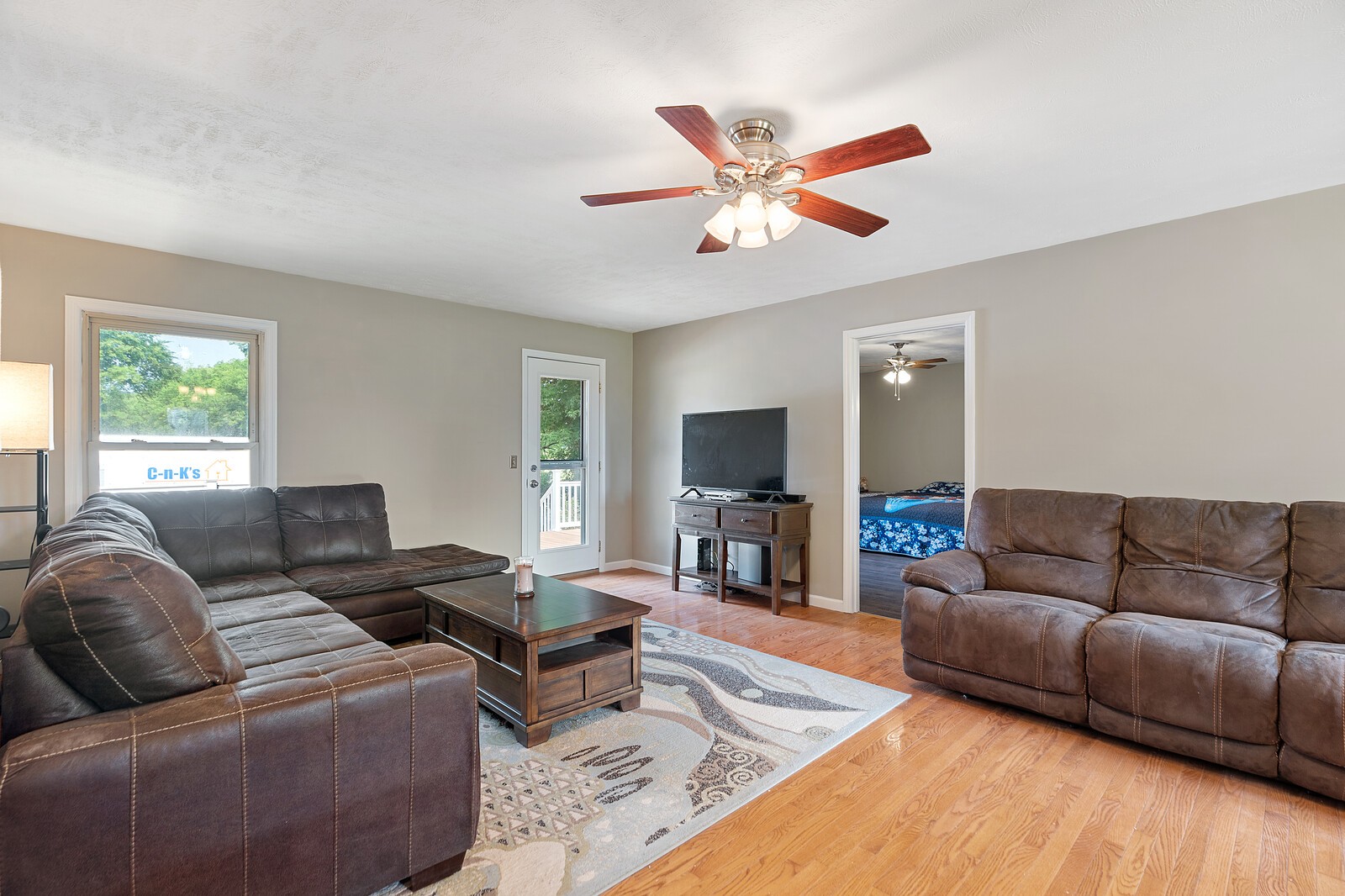 6658 Highway 49 Springfield, TN 37172 - Photo 19 of 44 a living room with furniture wooden floor and a window