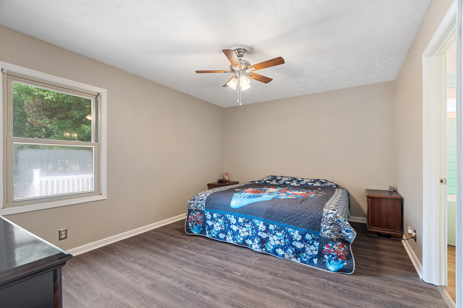 6658 Highway 49 Springfield, TN 37172 - Photo 23 of 44 a room with a window and wooden floor