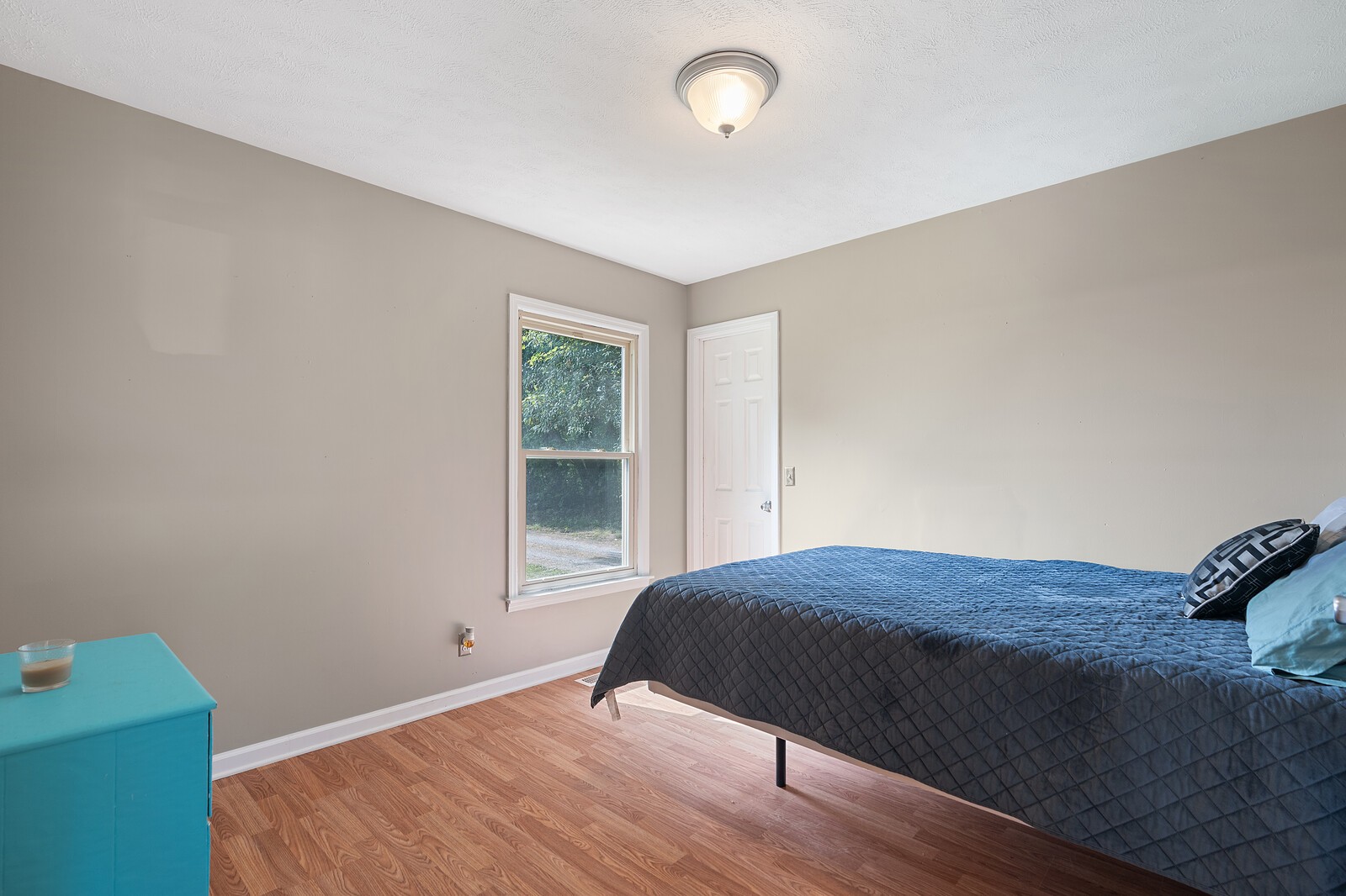 6658 Highway 49 Springfield, TN 37172 - Photo 27 of 44 a bedroom with a bed and window