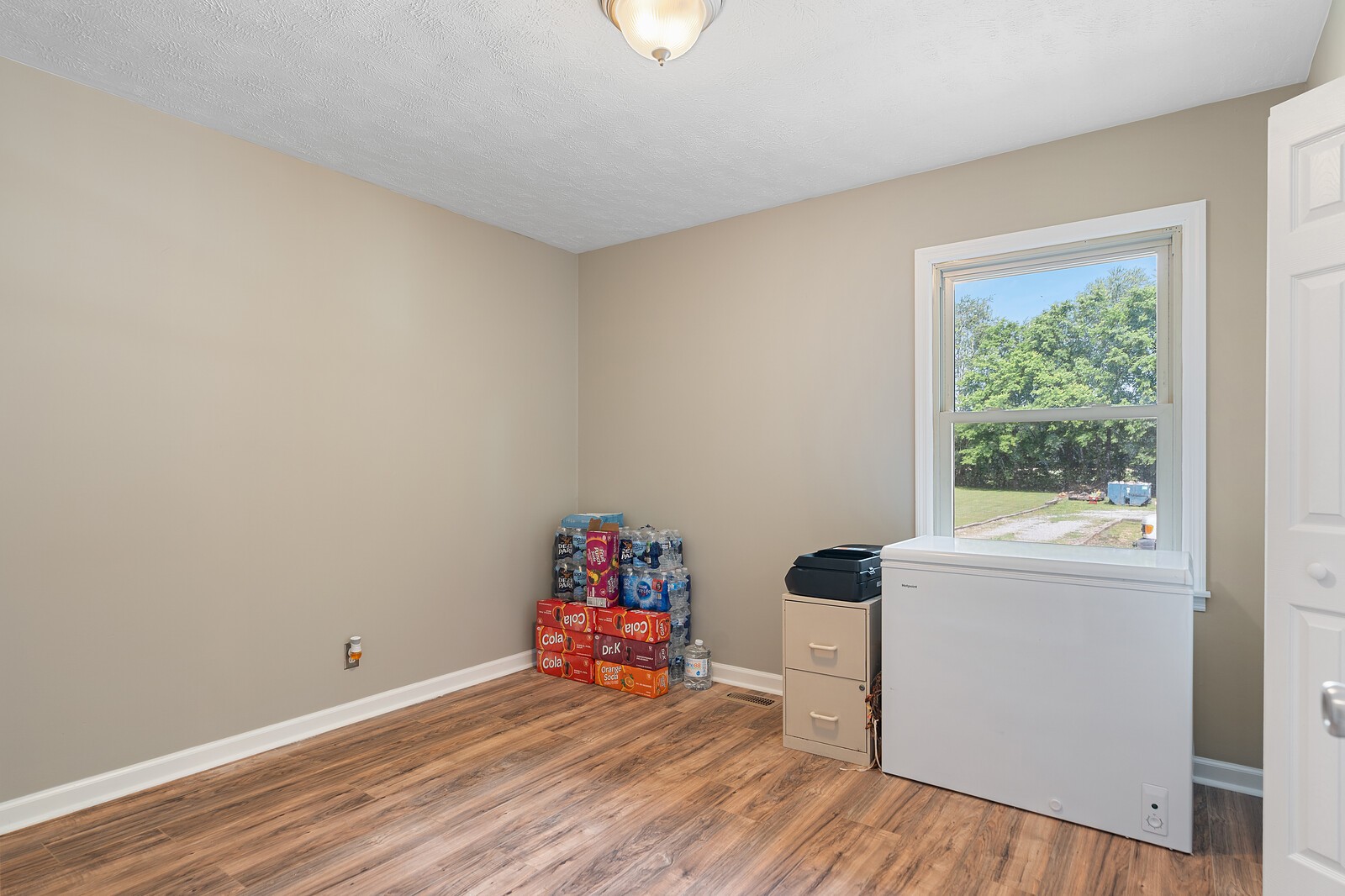 6658 Highway 49 Springfield, TN 37172 - Photo 30 of 44 a view of a room with wooden floor and a window