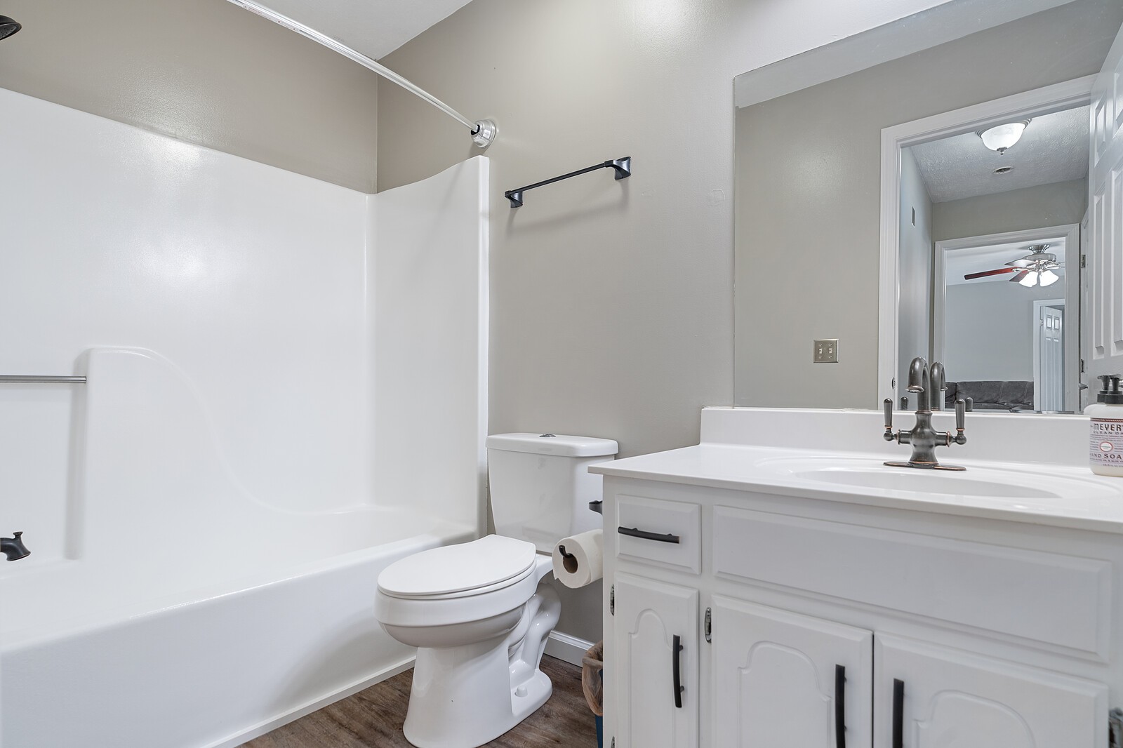 6658 Highway 49 Springfield, TN 37172 - Photo 32 of 44 a bathroom with a sink a toilet and a mirror